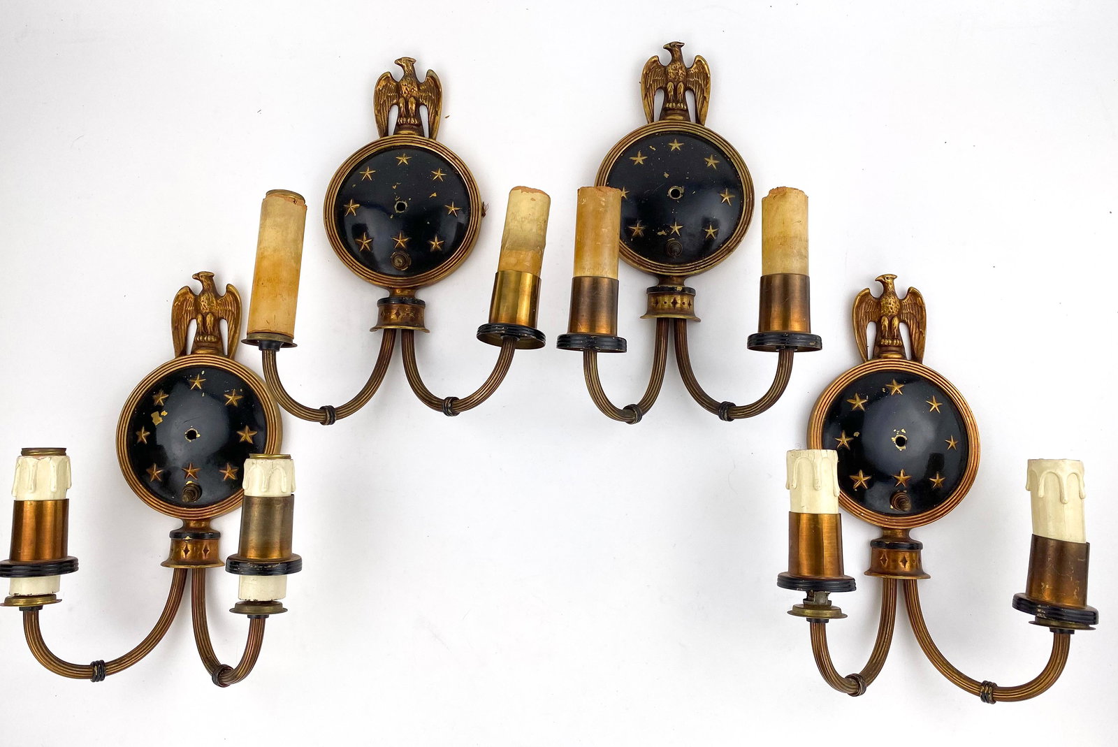4 Vintage or Antique Federal Style Double Armed Sconces: Double brass arm candelabra, colonial or regency style black and gold star sconces by Lightolier. From the Lightolier, after sunset line.***Please note Pick ups for this Auction must be made or arrang