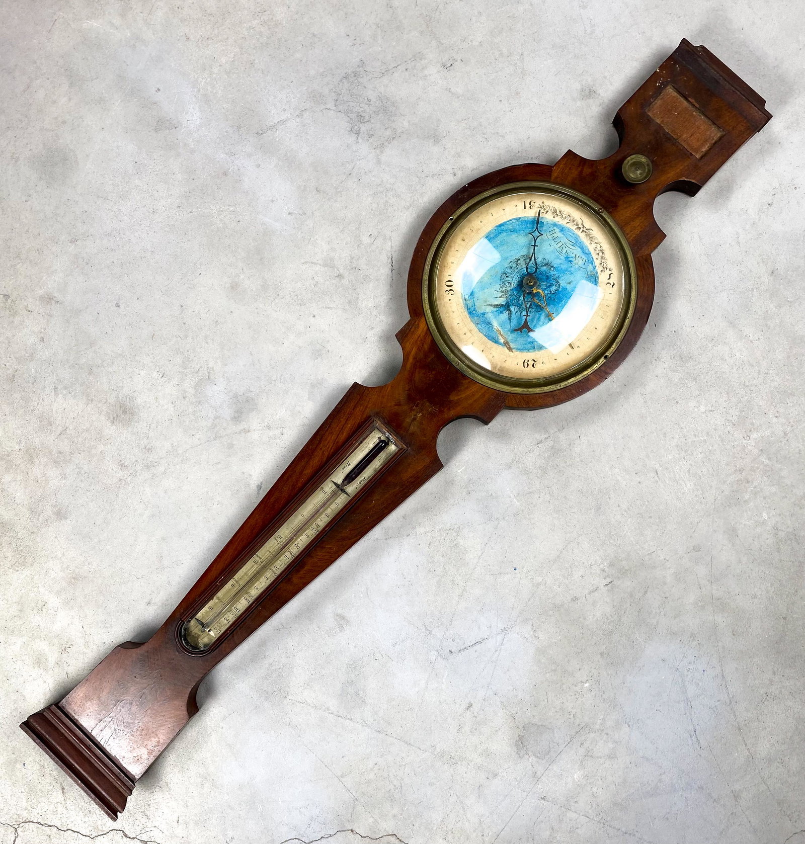 Louis A Smith Antique Blue Wheel Faced Barometer: Hand painted Wheel barometer, mahogany base, and brass barometric mechanical barometer. Made in New York 1841-45.***Please note Pick up for this Auction must be made or arranged for to be made by Augu