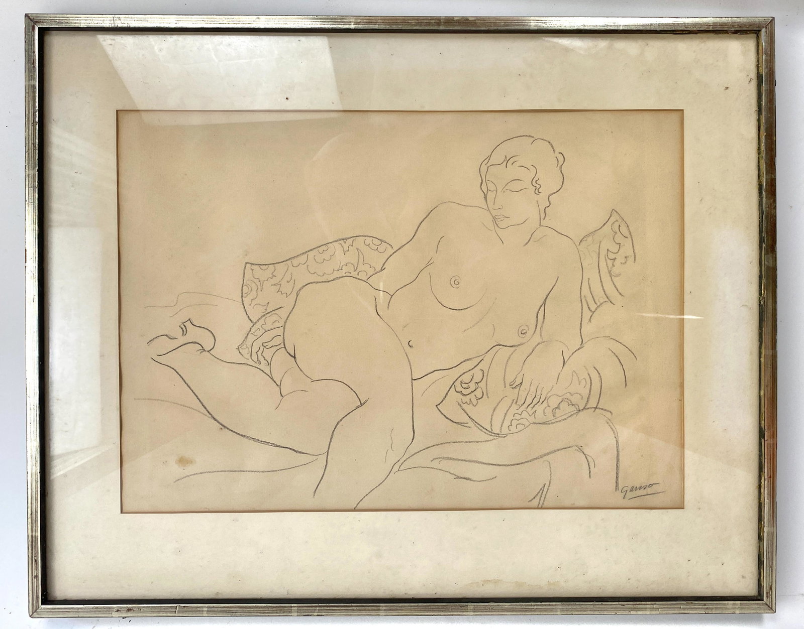 Reclining Nude Charcoal Framed and Signed Ganser: In the style of Henri Matisse, a female nude, minimalistically drawn. Excellent drawing. Image 20 x 14.25H frame 26.25 x 1.24 x 21 H