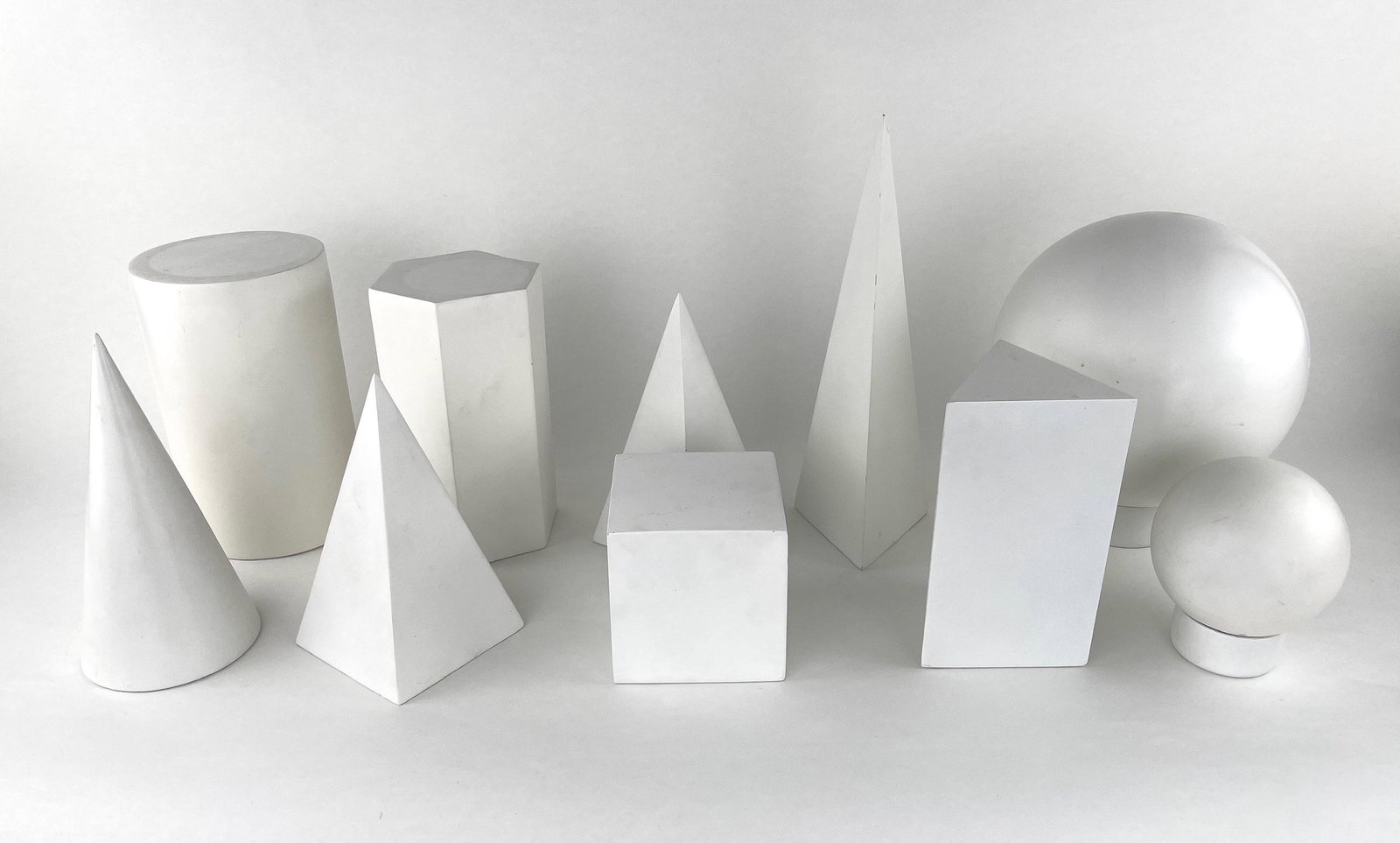 White Geometric Architectural Photo Props: Fantastic Custom Resin Architectural Geometric Models by "Statues.com". Beautiful modern, clean white sculptures. Used for still life photographs and later as interior decor, by renown artist Lynn St.