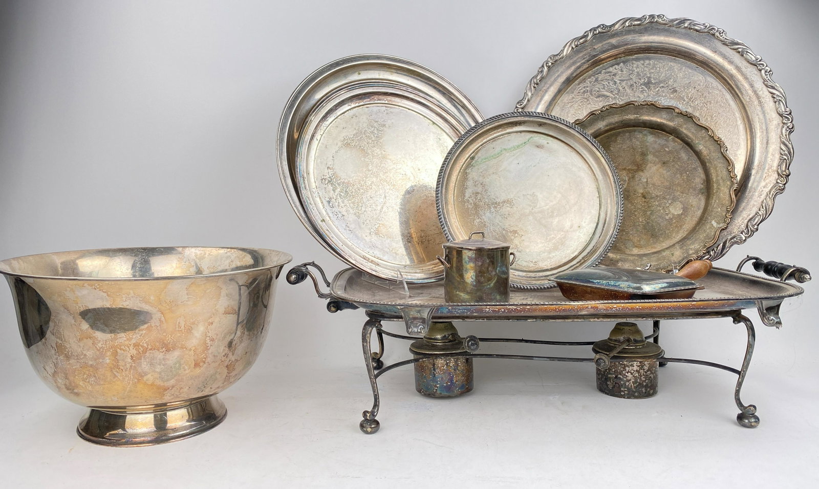 Vintage Collection Silver Plate Service Ware: Fantastic assortment vintage collectible silver plated silverware, silent butler hinged crumb pan with wooden handle, heating tray, serving trays, cocktail trays, candlesticks, ice buckets, silver bow