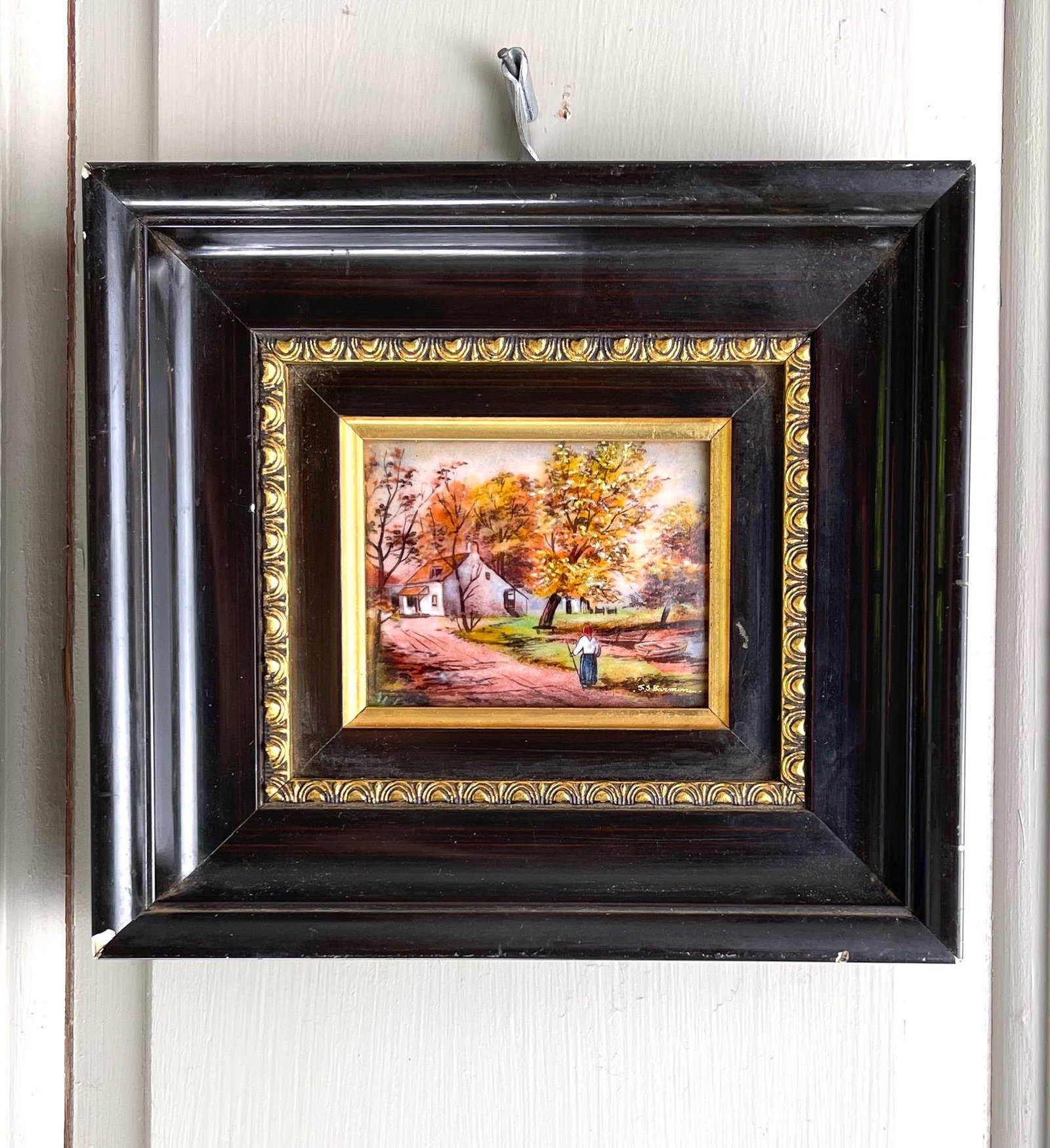 F.J. Carmona Capodimonte Hand Painted Limoges Porcelain Plaque - smaller: Beautiful Limoges enamel artwork depicting a white house overlooking pond with boat and standing woman on country lane. Painting measures W3.25" x H2.5".