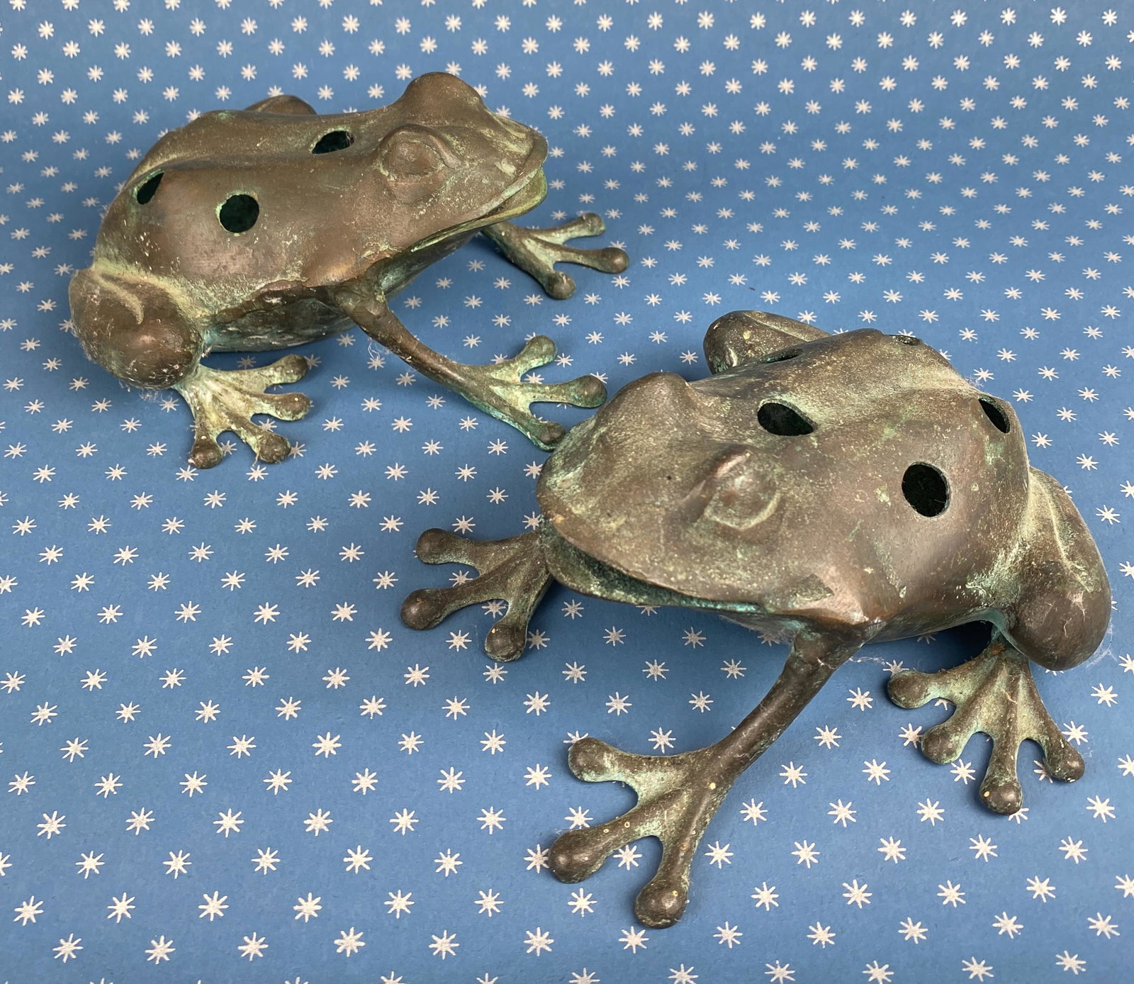 Pair of Medium to Large Sized Cast Brass Flower Frogs: Brass and or Copper mix, cast, frog figurines with flower stem placements on backsides. 7" Long x 6" Wide, 3 1/2" H.