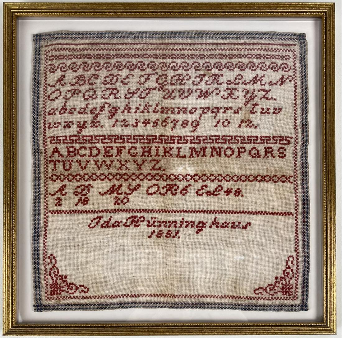 Antique 1881 Framed Needlepoint Alphabet Letter Sampler: Made by Ida Hunninghaus in 1881Red thread on white background with blue ticking like border, the sampler measures appx 13 x 13". Frame: 15 1/4" x 15 1/4"