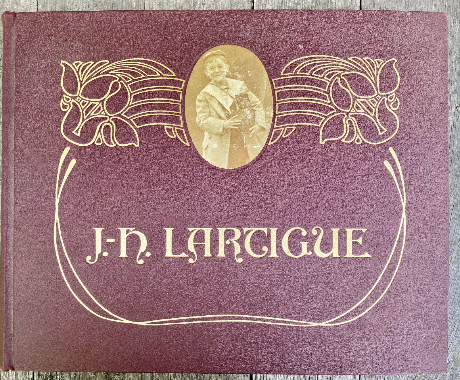 Signed hardcover Book - Boyhood Photos of J.H. Lartigue: Signed inside, by J.H. Lartique, the album is reproductions of Boyhood Photos of J.H. Lartigue -- The Family Album of a Gilded Age.Copyright 1966.