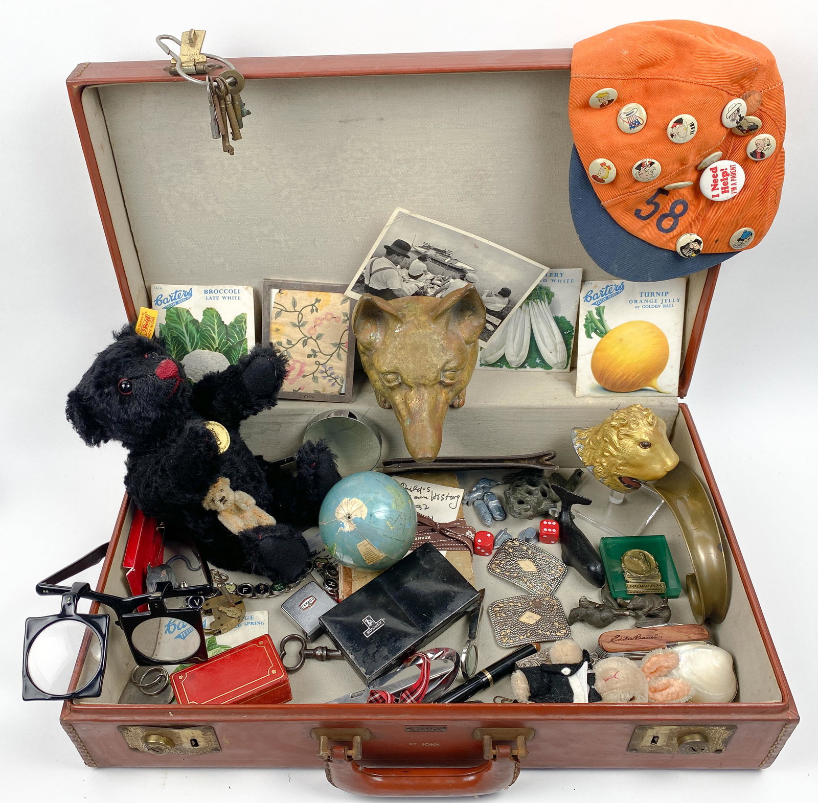 Mixed Lot of Antiques & Vintage Collectables in Leeds Case: In this vintage Leeds all genuine leather, travel case, a variety of odds and ends...Old Monopoly Figures, Denmark Letter Opener, Sterling Silver Vintage Frame, Steiff Black Teddy Bear, Small and heav