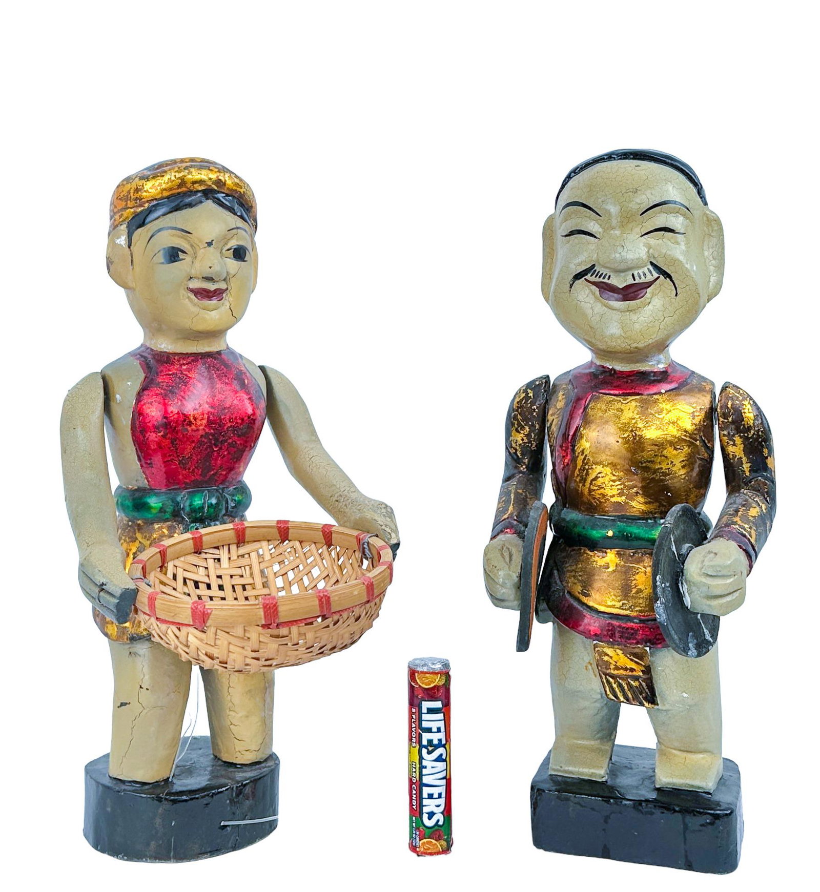Antique Vietnamese Water Puppets: Vintage Pair of Vietnamese water puppets made of wood, paper mache and lacquer. One plays the cymbals, one carrys a basket. Moving limbs with fishing wire threaded through the back. Dimensions Width: 