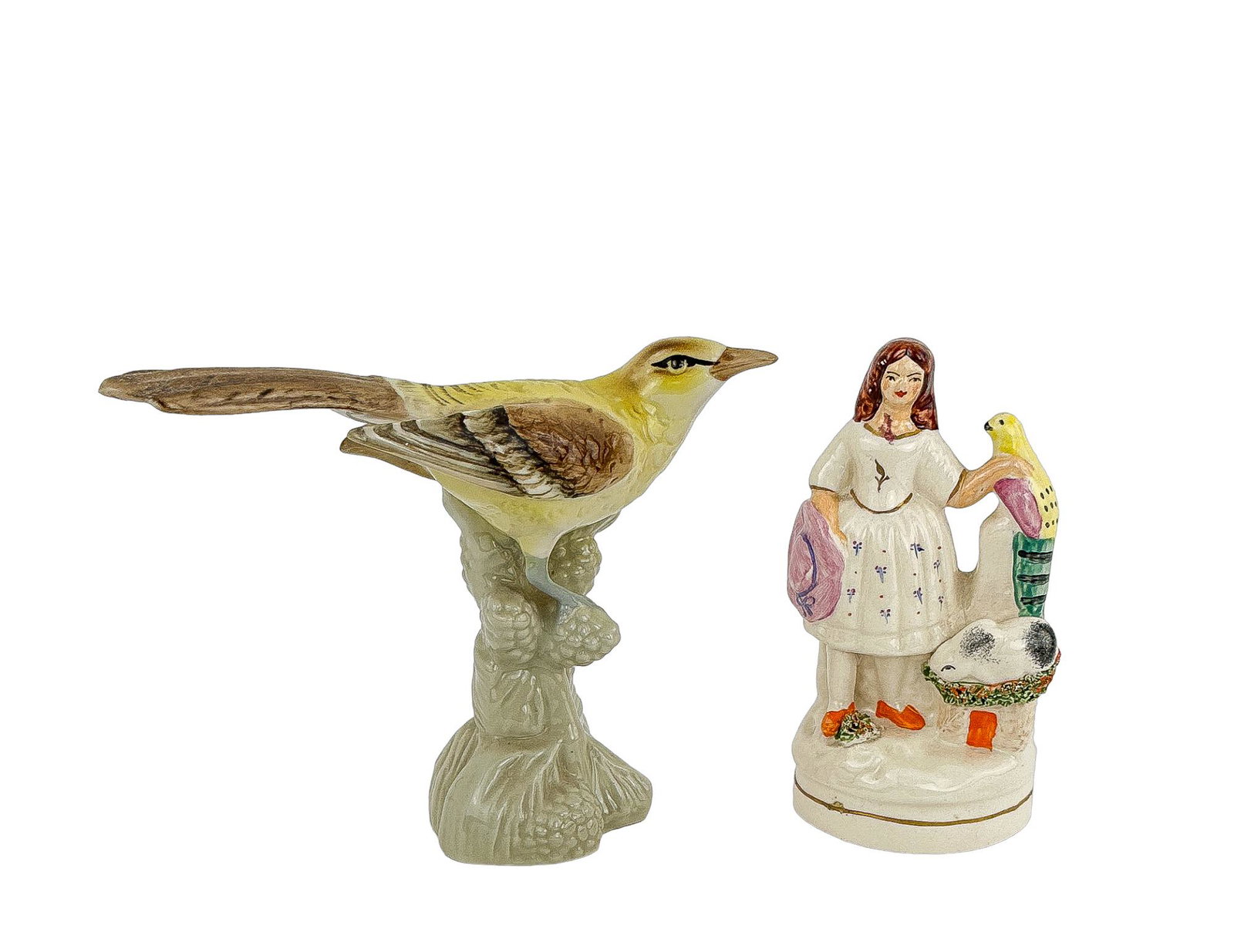 Porcelain Figurines: Vintage Royal Dux canary figurine and Staffordshire style figure of girl with parrot and bunny in porcelain. Dimensions Width: Depth: Height:
