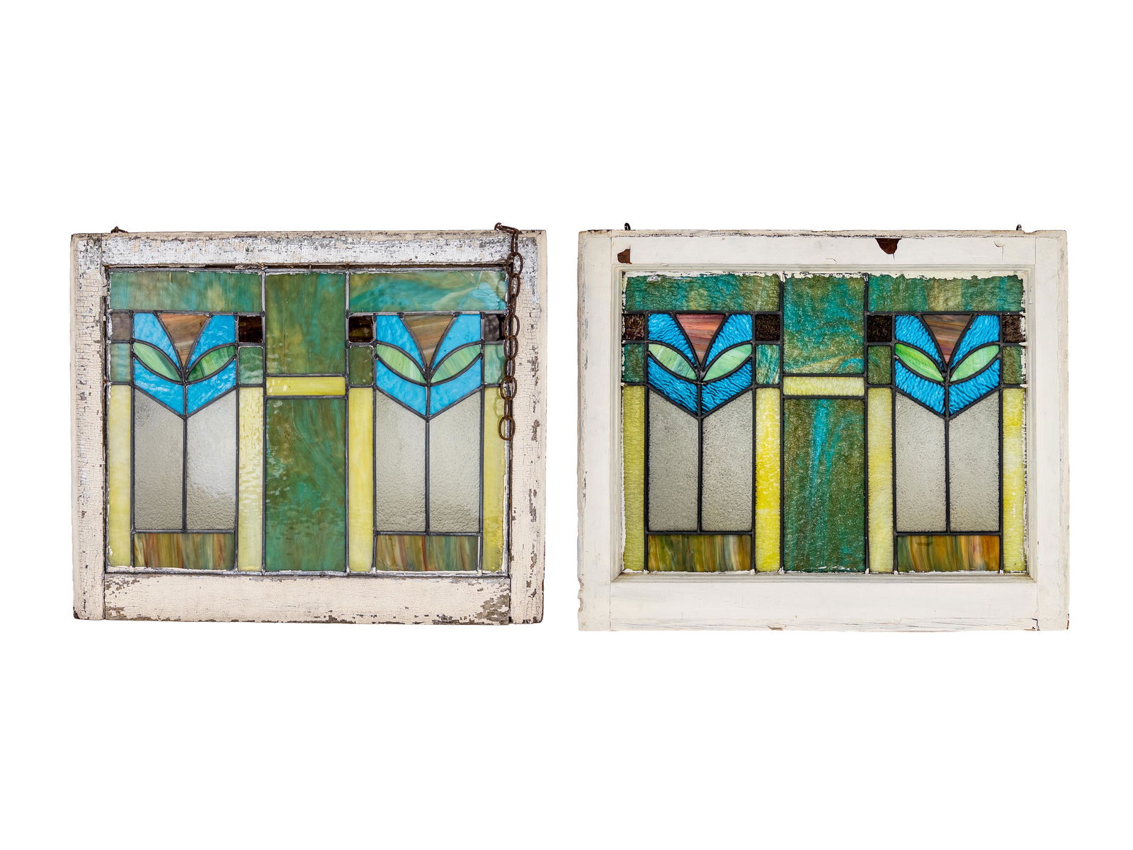 Pair of Early 20th Century Stained Leaded Glass Windows: Dimensions (each) Width: 27 3/4" Depth: 1 1/4" Height: 22 3/4"