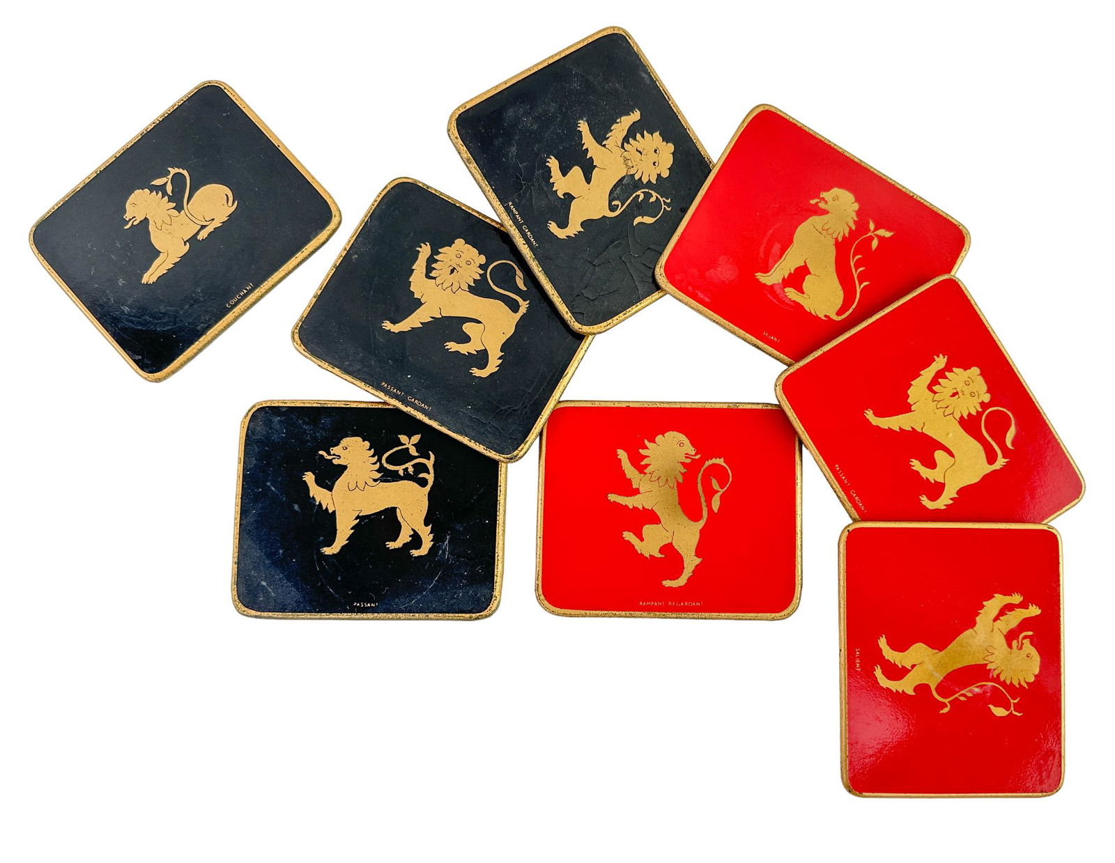 Mid Century Coaster Set of 8: Each coaster has a bottom lined in felt and measure 4 1/4 L x 3 1/2" W various wear to each surface.