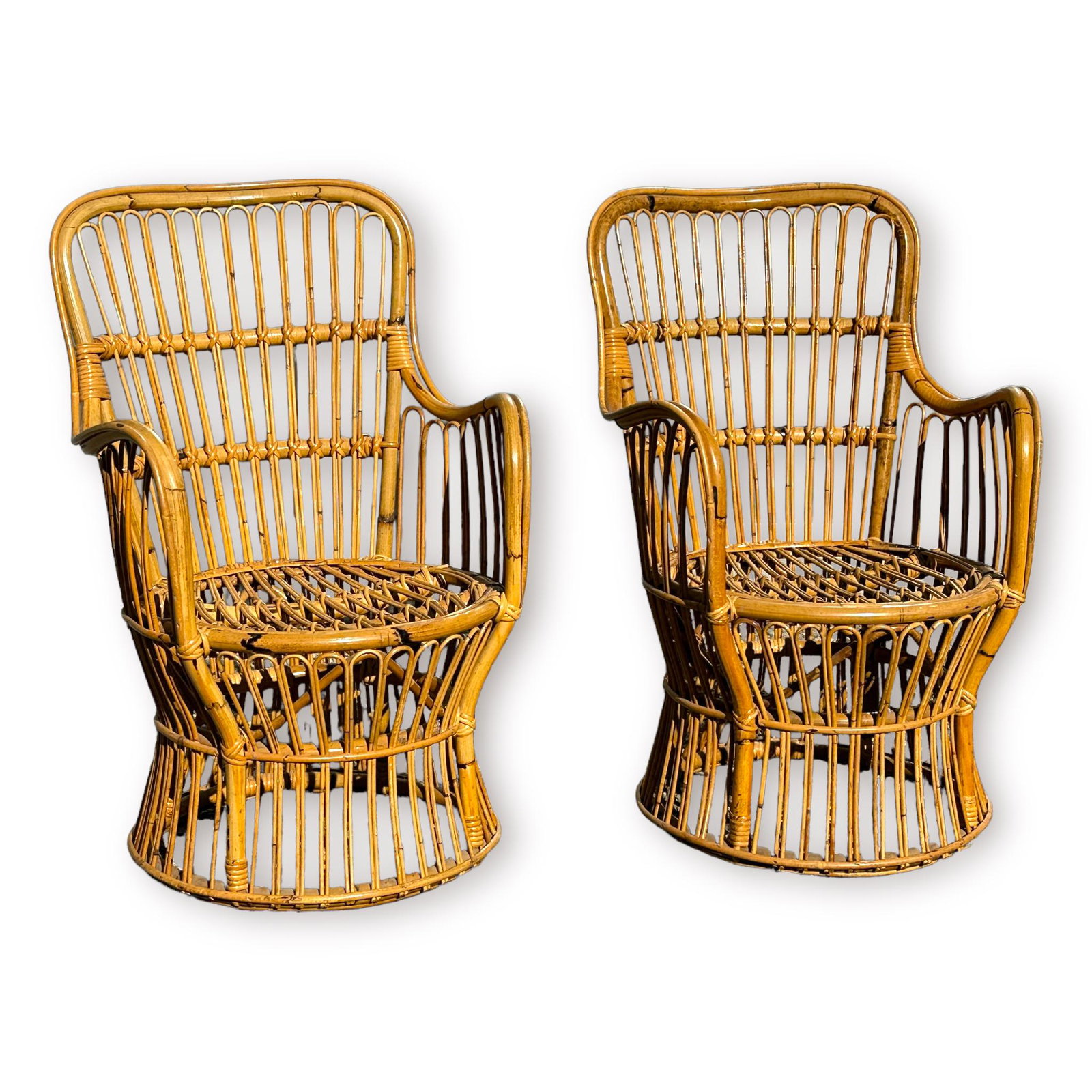 Luigi Caccia Dominioni, Italian Mid Century Rattan Armchairs: A pair of of Italian Mid-Century mod, mixed with hollywood regency style, rattan (or bamboo and bent wood) armchairs designed by Luigi Caccia Dominioni, circa 1960s. Curved arms and circular seat and 