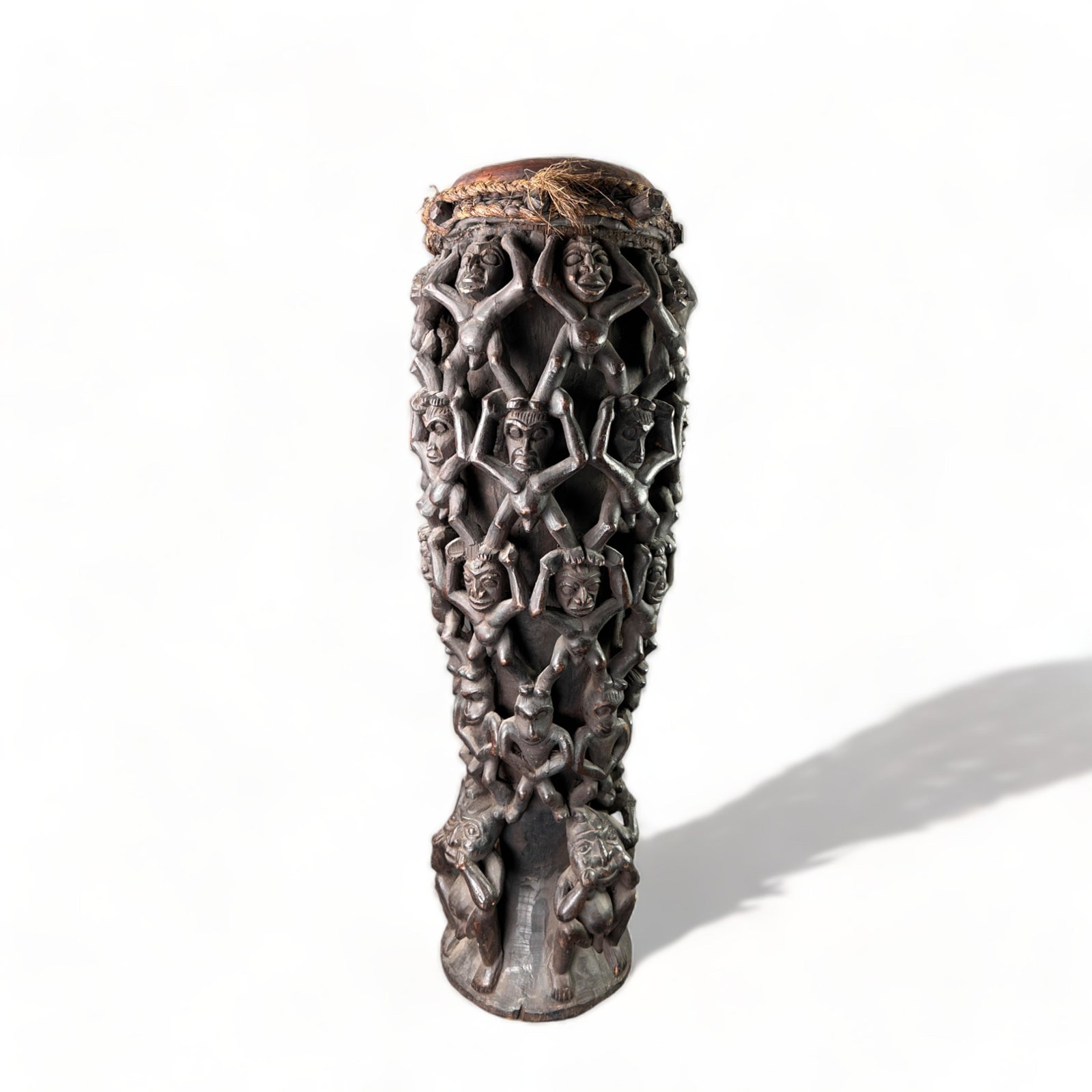 Bamilke Style Drum, Cameroon, Africa: Impressive and intricately carved possible Bamilke drum supported by rows of carved nude male figures, Cameroon, Africa: 17" D x 45" H