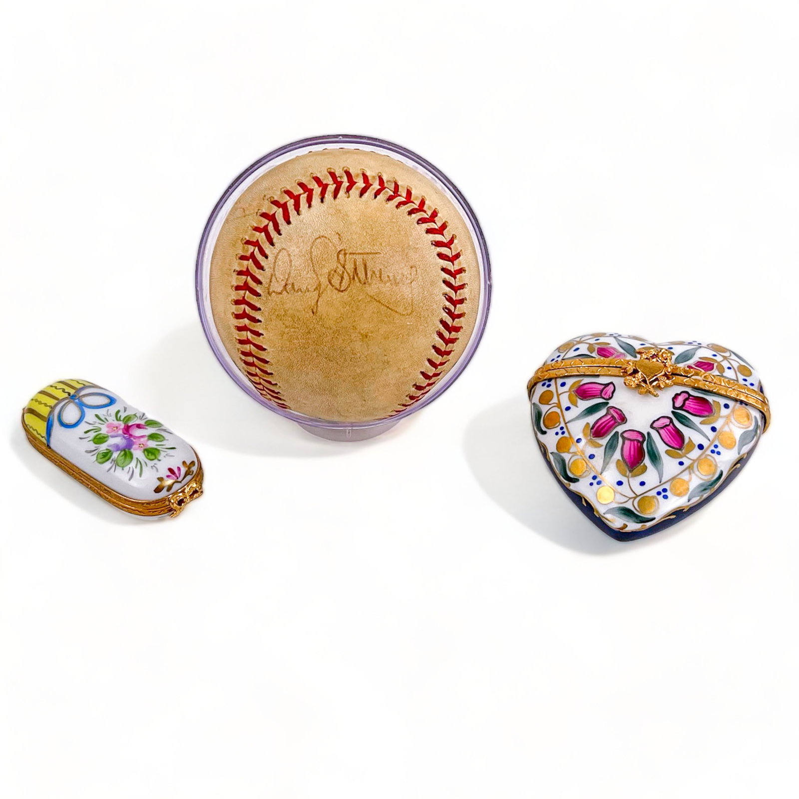 Limoges Porcelain Heart with Glass Parfume and Oval Pill Boxes: Hand peinted heart shaped box with brass heart and flowers closure. Inside contains miniature glass parfume bottle with brass top. Long oval hand peinted pill box with floral details and brass ribbon