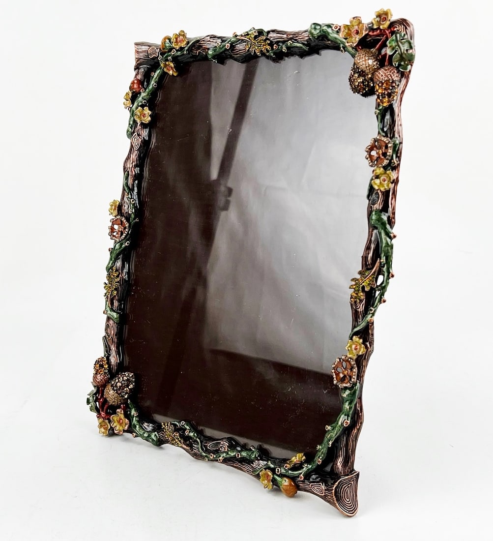 Jay Stongwater Twig and Acorn, Swarovski Crystal Frame: Beautiful Jay Strongwater Frame, with twig and acorn motif adorning swarovski crystals. Includes original box with foam padding, dusk cover and screwdriver. Measures 9" W x 3/4" D x 10 3/4" H **NOTE**