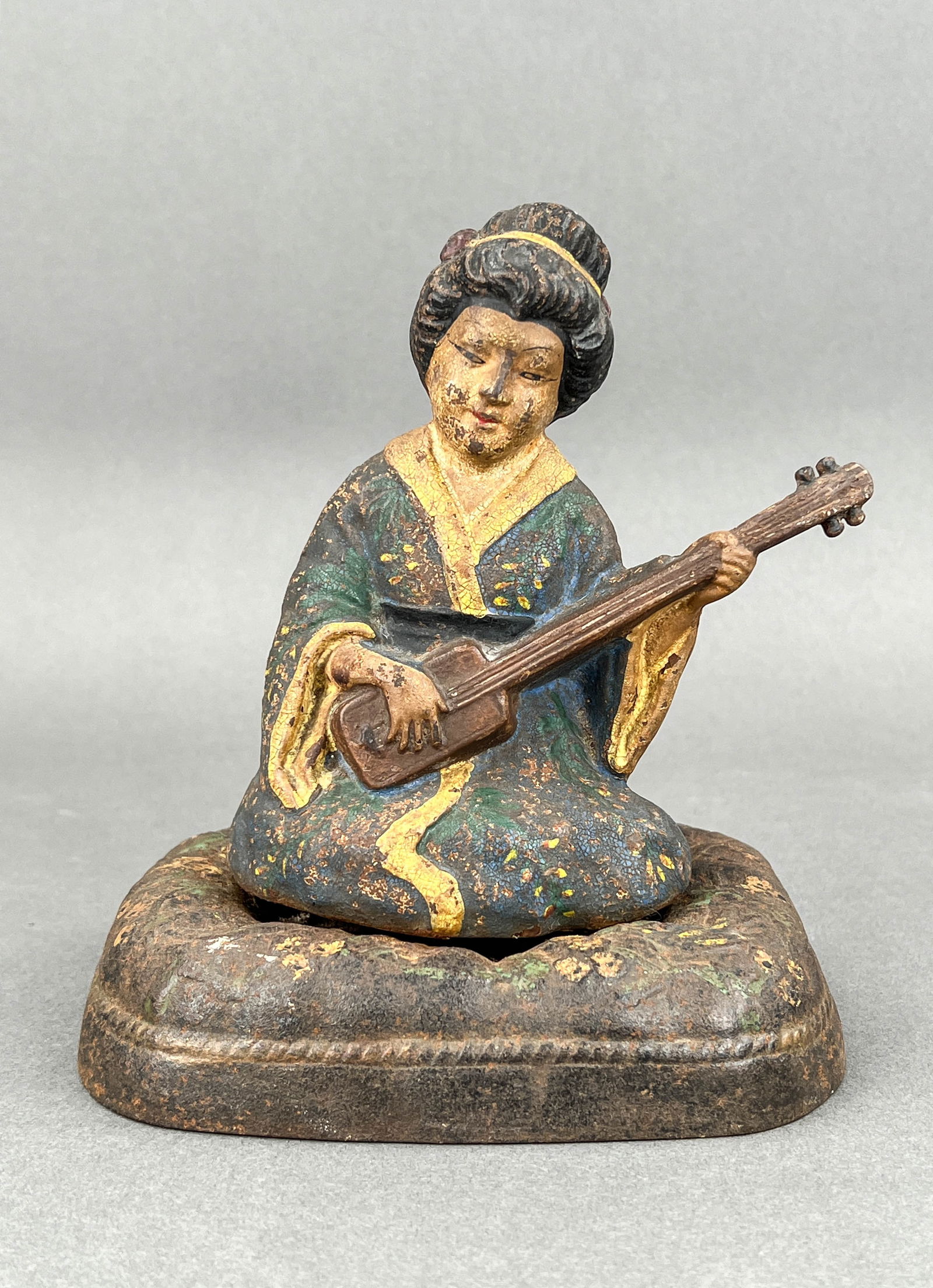 Antique Hubley Cast Iron Japanese Mandolin Geisha: Rare anitque cast iron mandolin geisha, Hubley cast iron, original paint, patina from age. Measures 6" W x 5" D x 7" H