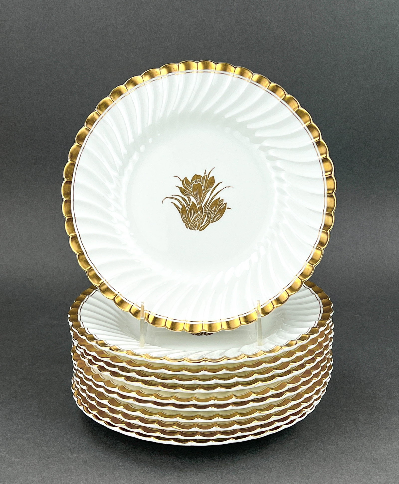 Minton China, Tiffany & Co NY Made in England: Bone and Gold with Scallop Detail. Eleven Plates in Total. Each Measures 9" Dia x 1" H
