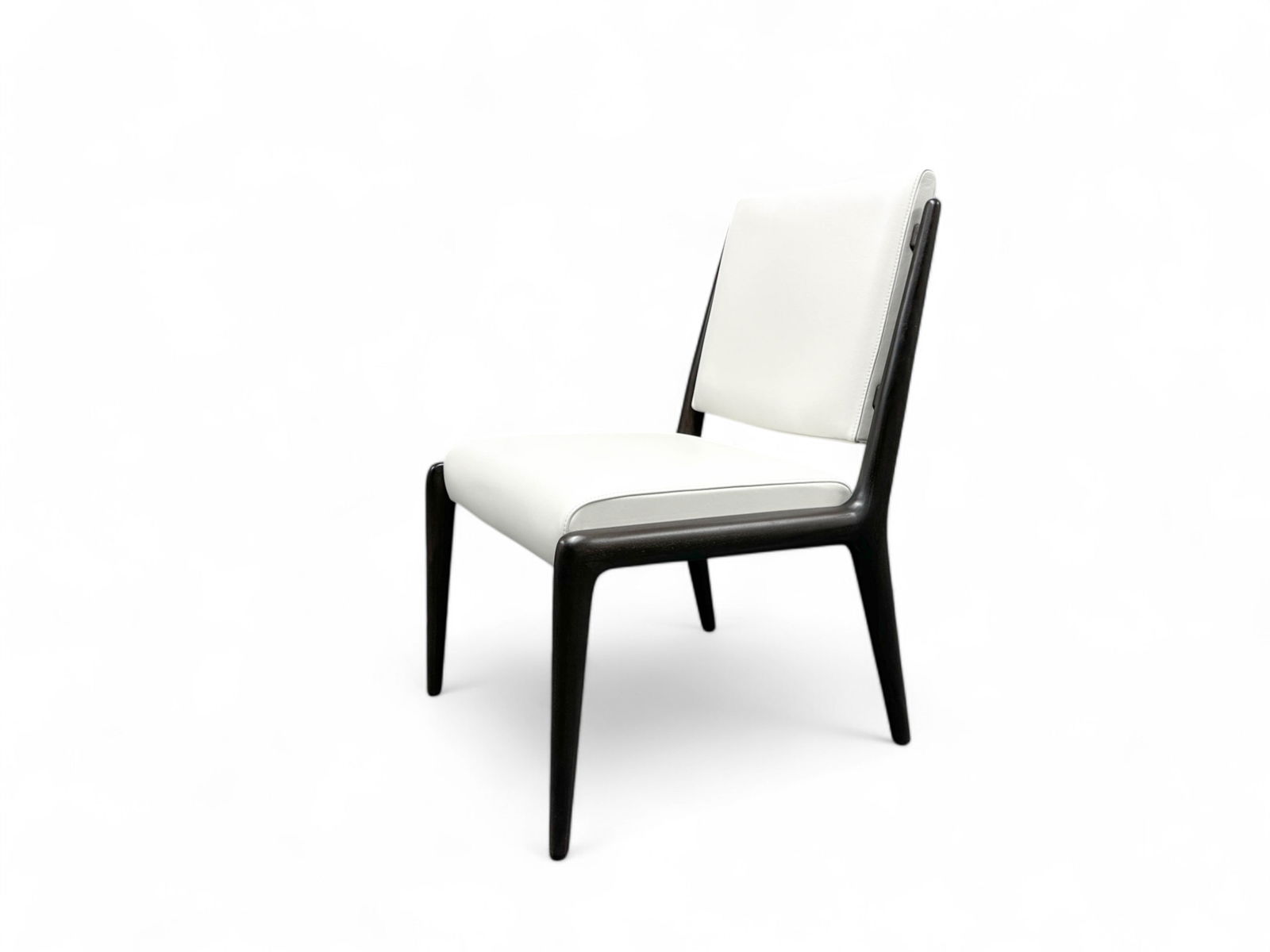Holly Hunt Cote Dining Side Chair, Set of 4: Custom made unused, Holly Hunt "Cote" Dining Side Chairs in white leather upholstery, frame made of walnut in "Walnut Black Magic" and metal detail in bronze with a dark bronze finish. Still available