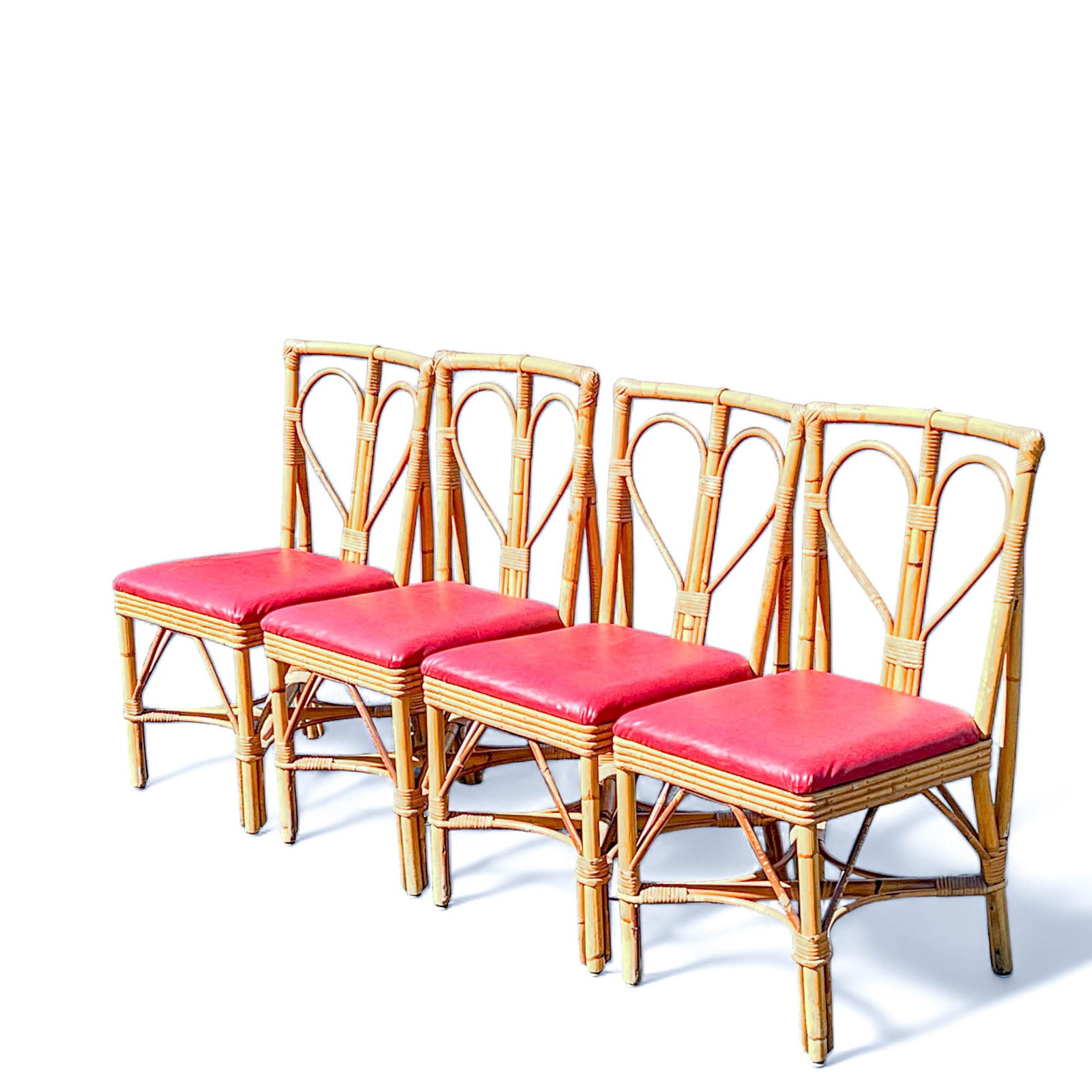Rattan Heart Back Side Chairs with Red Naugahyde Seat: Chairs Measure 16 1/2" W x 19 1/4" D x 34" H / 17 1/2" Seat Height