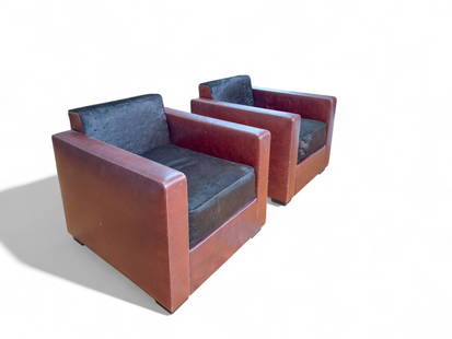 Linea A Club Chairs by Poltrona Frau: A charper take on the classic french club chair. Leather arms and body with dark brown/black calf hair back and seat upholstery. Each chair Measures 28 1/2" W x 33" D x 28" H / 18" Seat Height