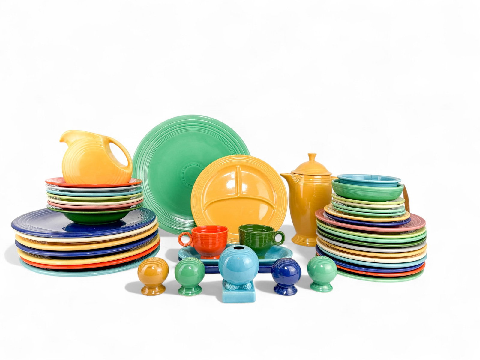 Original 1930's Homer Laughlin Fiestaware Tableware: Set of many pieces collected over the years of 1970-1990 Dinner Plates Measures 12 1/4" Large Serving Platter Measures 14 1/2" Salad Plates Measures 9 1/2"