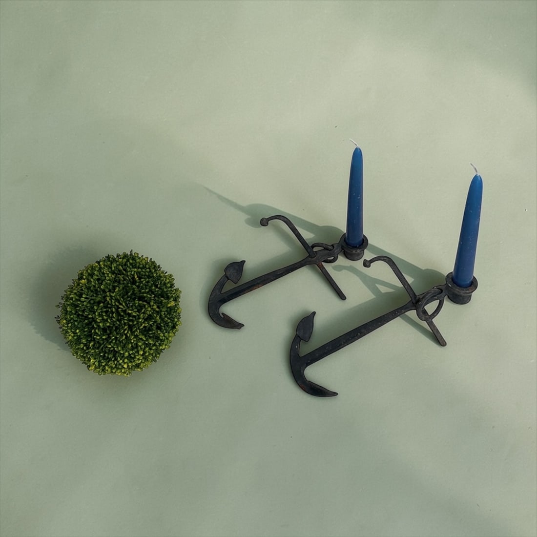 Pair Antique Wrought Iron Anchor Candlesticks: Phenomenal stoic, pair of antique, black wrought iron anchor candlesticks. Dress any table or credenza with these attention drawing details. Each Candlestick Measures 7" x 9 1/2" x 5" H