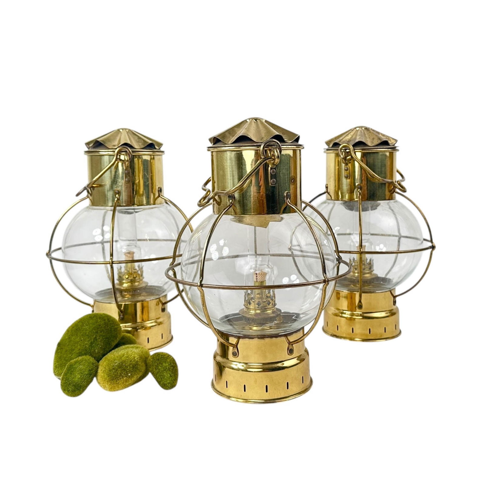 (3) Nautical Brass Onion Oil Lamps: Three Vintage or antique Brass and Glass ships oil lanterns each measures 9" Diameter, 12" H
