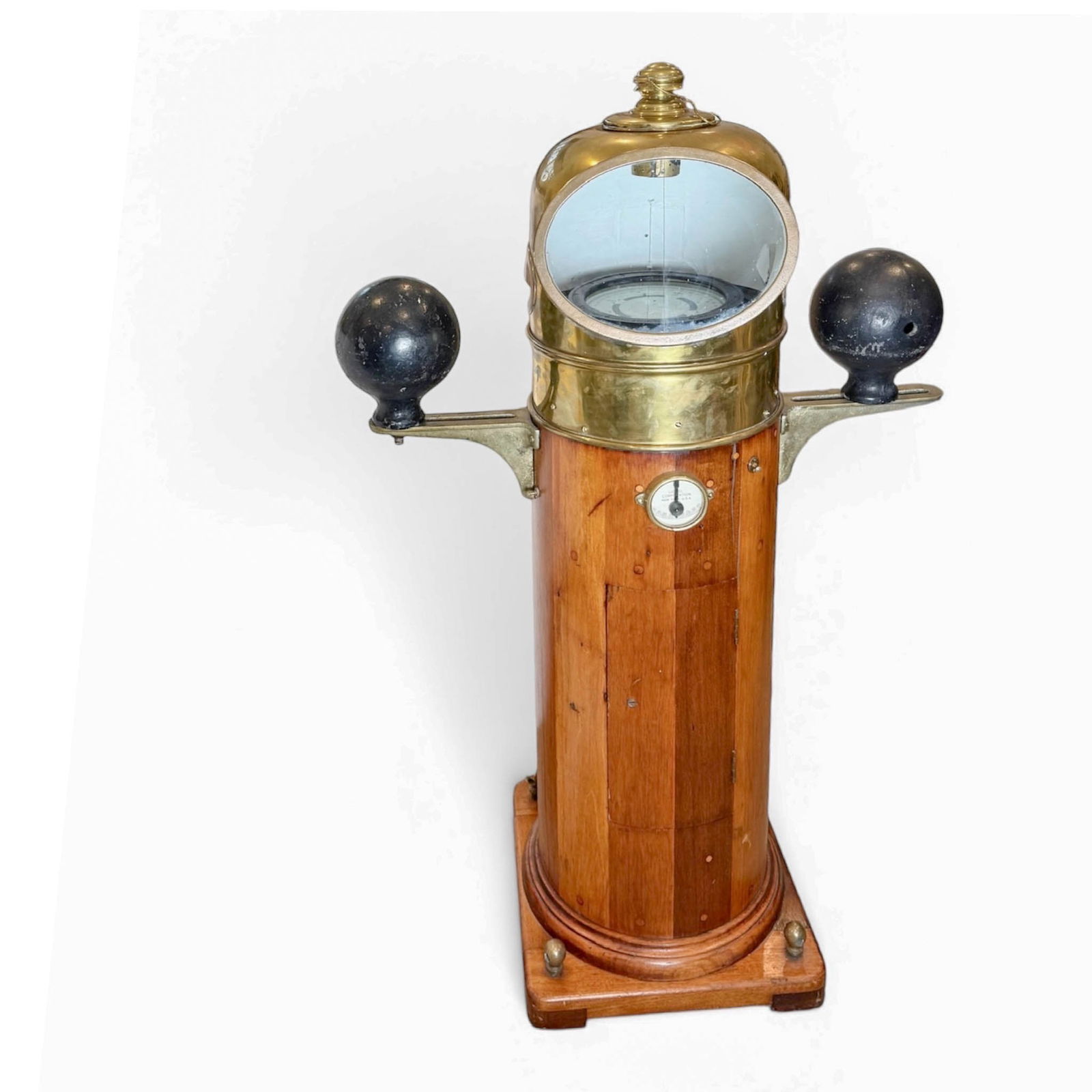 c.1942 Ships Compensating Binnacle, Lionel Corp New York: Ships Compensating Binnacle manufactured by Lionel New York, c. 1942. With manufacturers plate and serial number 10060. Made of Teak wood, Brass, glass, cast iron compensating balls and fitted with U.