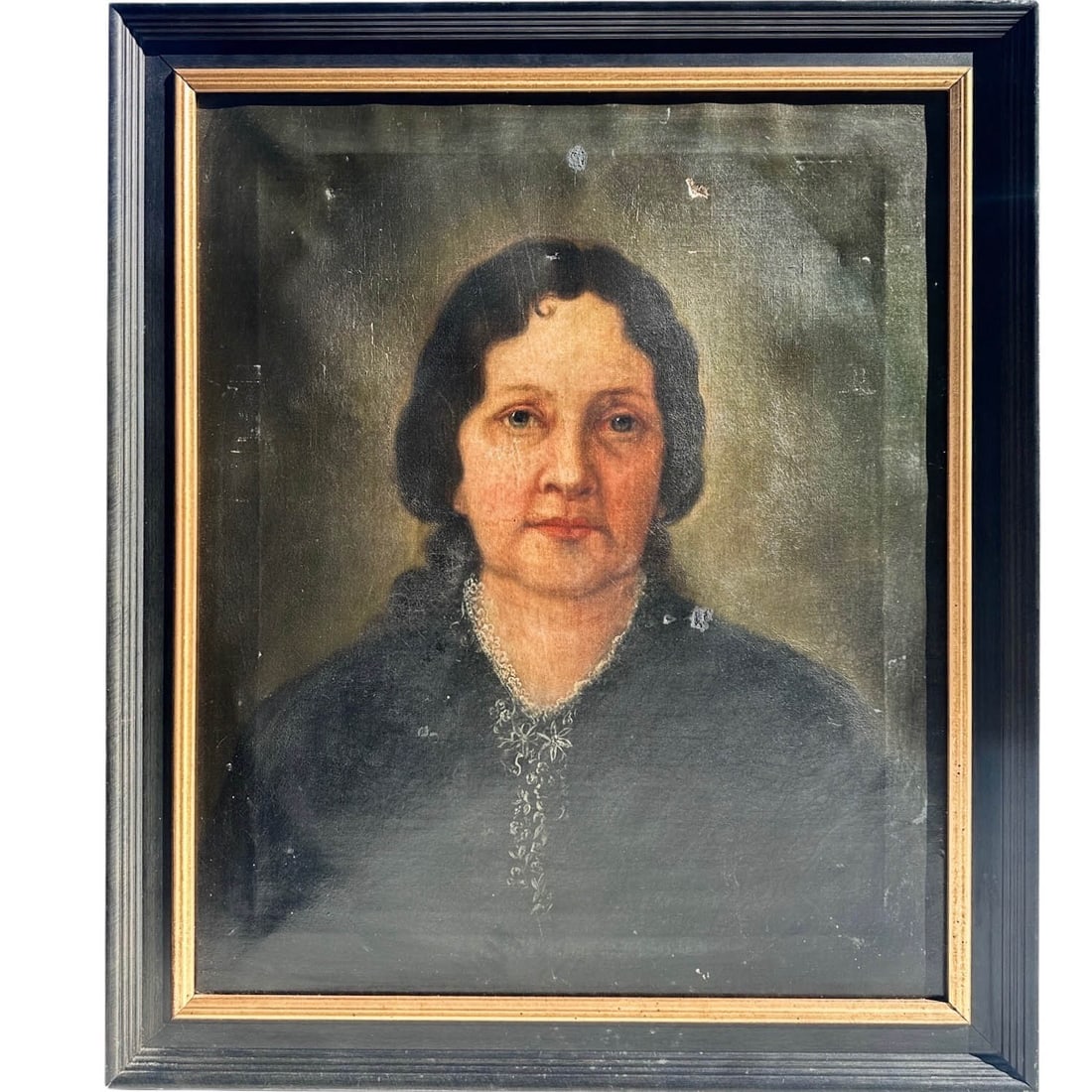 19th C. Oil Painting Portrait of a Woman with Blue Eyes: Antique 19th c. oil on canvas portrait painting of a woman with blue eyes, her hair loosely tied back, in dark clothing with lace pattern at the collar or neckline. Frame Measures 23 3/4" W x 28" H Ca