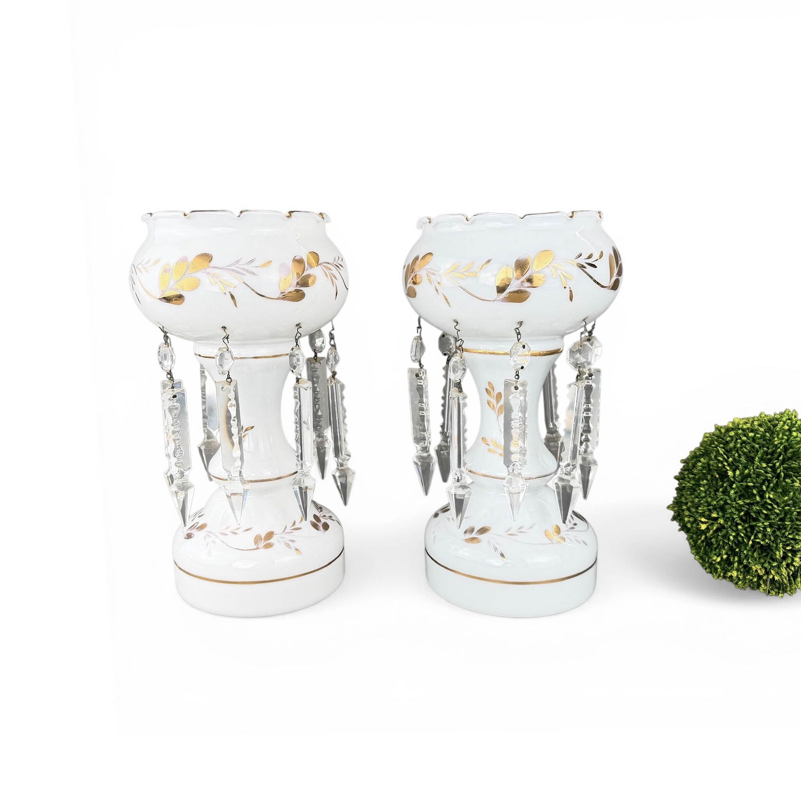 Mantle Lusters in Opaline Glass and Crystal: Electrified Mantle Lusters in opaline glass with gold leaf finishing and spear shaped cut crystal drops. Each Lamp Measures 5 1/2" Diameter x 7" Tall
