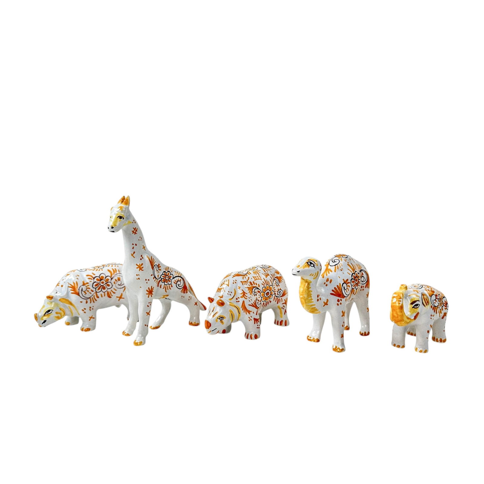 (5) French Faience Stoneware Animal Figures c. 1910: Five antique French Faience, tin glazed earthenware or ceramic animal figurines with rustic country hand painted motif in yellows and black on white background. Animals consist of Giraffe, Camel, 2 Rh
