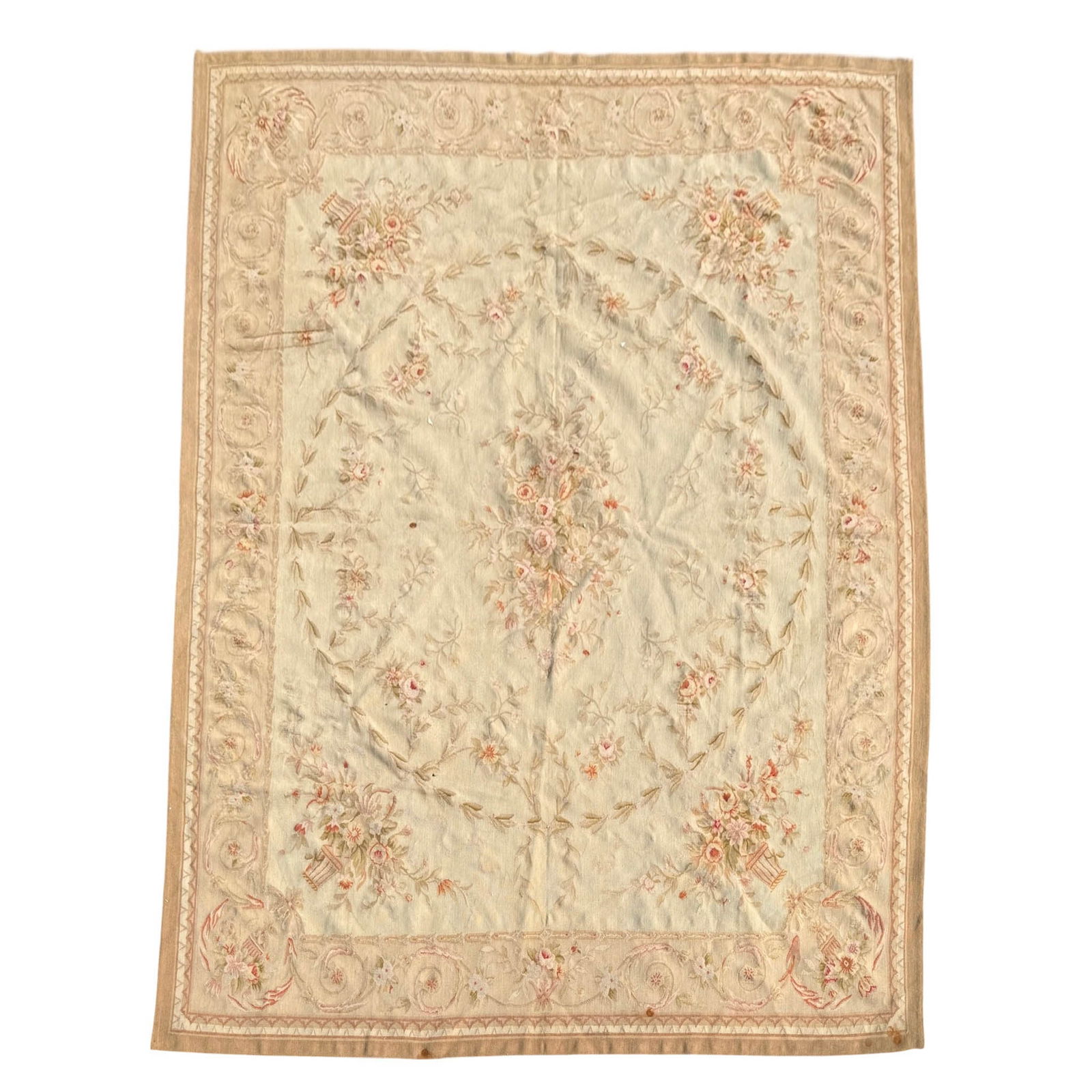 10 x 8' Aubusson Style Flat Weave Rug: Floral Medallions on a light tan ground. Measures 93" x 121" Please refer to the following address for the pick-up location: 2 Quogue Plaza Trail, Quogue, NY 12113
