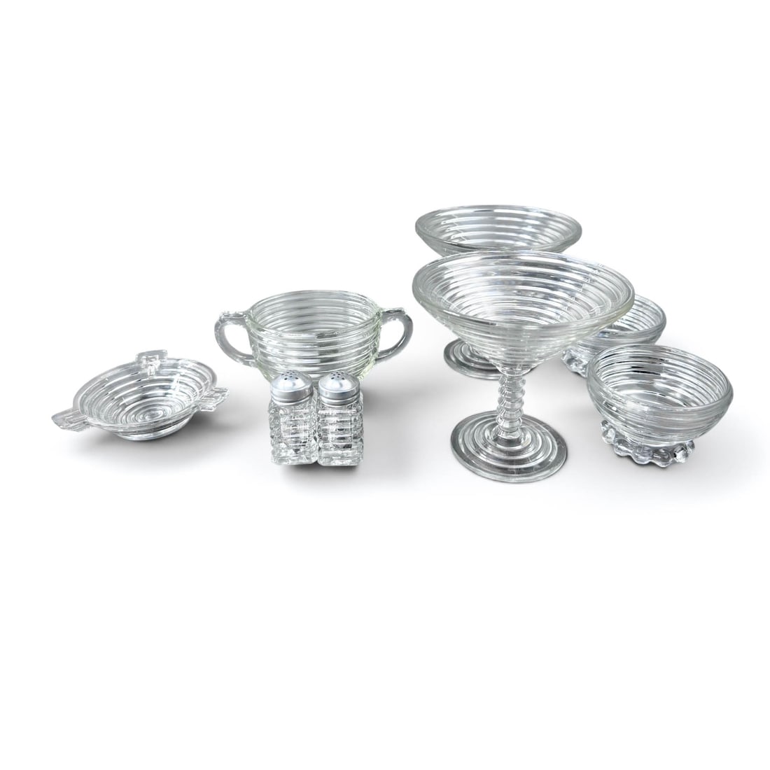 Anchor Hocking Manhattan Deco Glassware, Assorted Collection, 8 pcs: C. 1938-43, The Anchor Hocking Manhattan Deco Glassware are distinct and highly sought after. This small assemblage consists of one pair of Salt and Pepper Shakers, Two Martini Glasses, one double