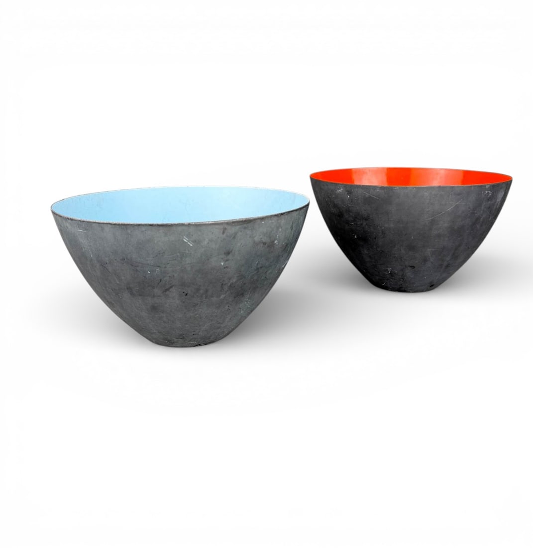 Herbert Krenchel Krenit Bowls, Steel and Enamel: Two large mid century modern danish Krenit bowls in light blue and orange enamel with steel exteriors. Bowls Measure