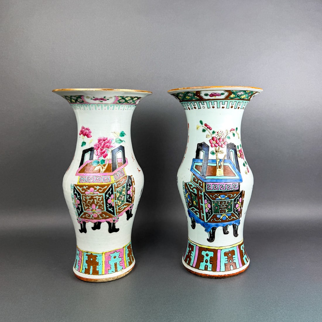 Pair of FAMILLE ROSE BALUSTER VASES: Pair of Antique, 19th c. Chinese Famille rose baluster shaped vases with flower basket motif and geometric edging 14" h x 7 1/2" dia
