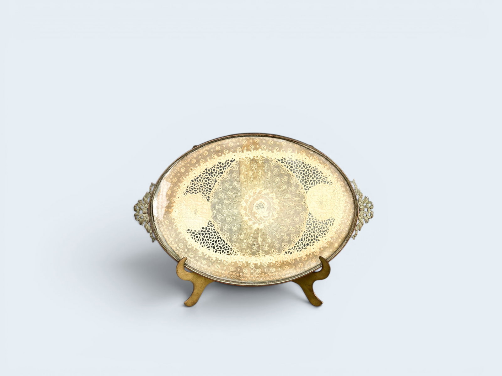 ANTIQUE BRASS ORMILOU AND GLASS VANITY TRAY: Antique or vintage brass ormilou tray with lace insert between glass.