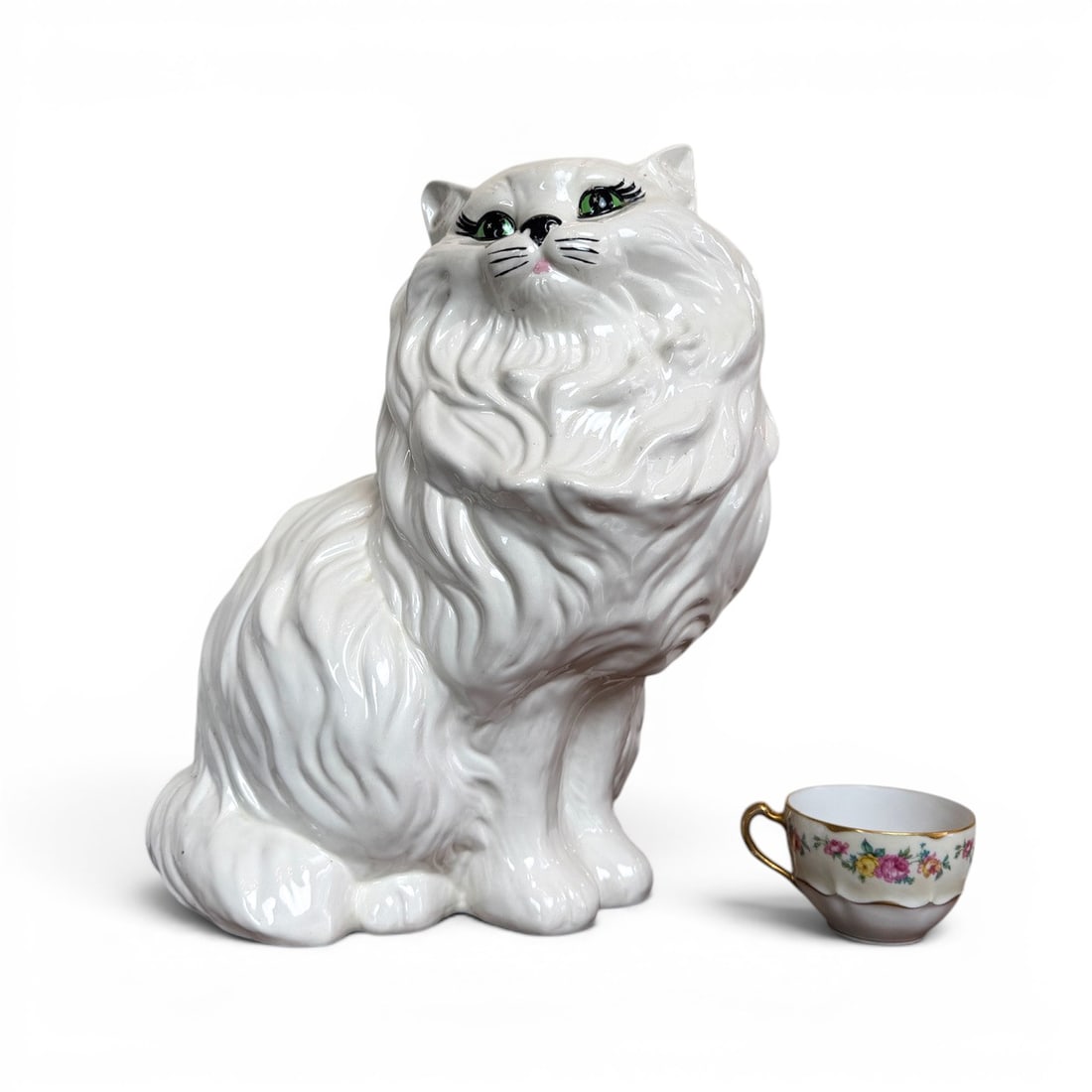 c.1960 LARGE CERAMIC PERSIAN CAT FIGURE: 14 1/2" tall ceramic white persian cat figure with green eyes.14 1/2 x 11 x 9" d