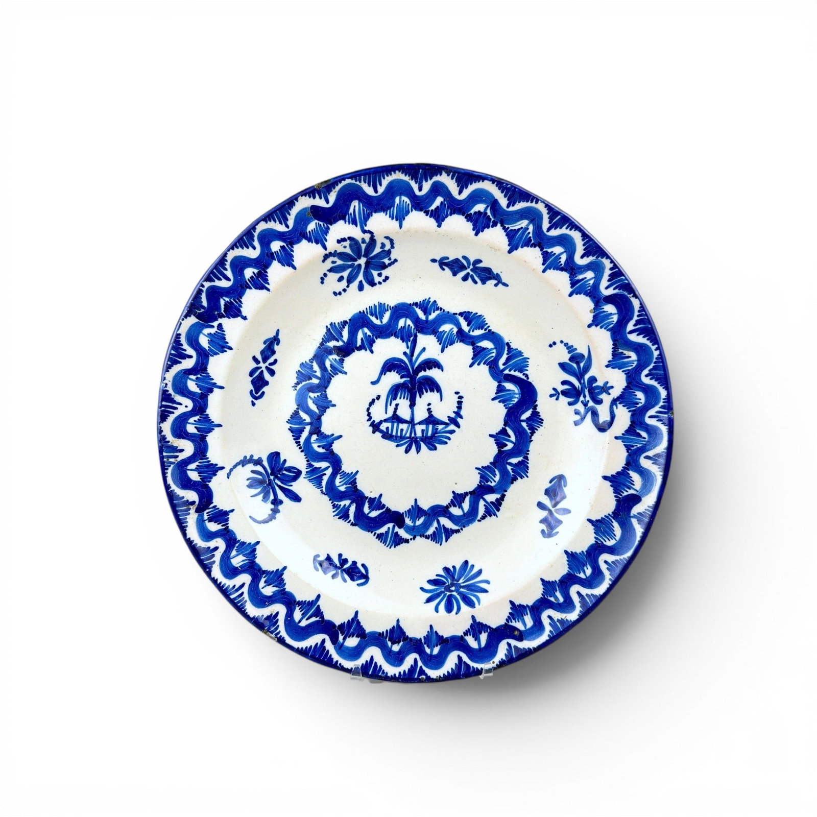 19th c. SPANISH (Manises) FAIENCE PLATE: Antique c. 19th century, blue and white glazed ceramic, Spanish Faience plate from Manises has a 13 1/2" Diameter, 1 5/8" h
