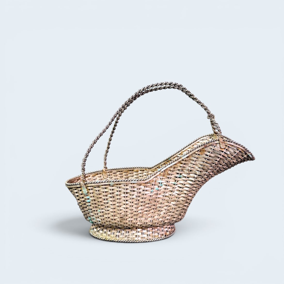 TAXCO MEXICO STERLING WOVEN WINE CADDY: Mid Century Vintage Taxco Mexico woven sterling silver bottle pouring basket. Stamped "PAPATEADO MEXICO TAXCO" 8 3/4" H x 11" W x 4 13/4" D
