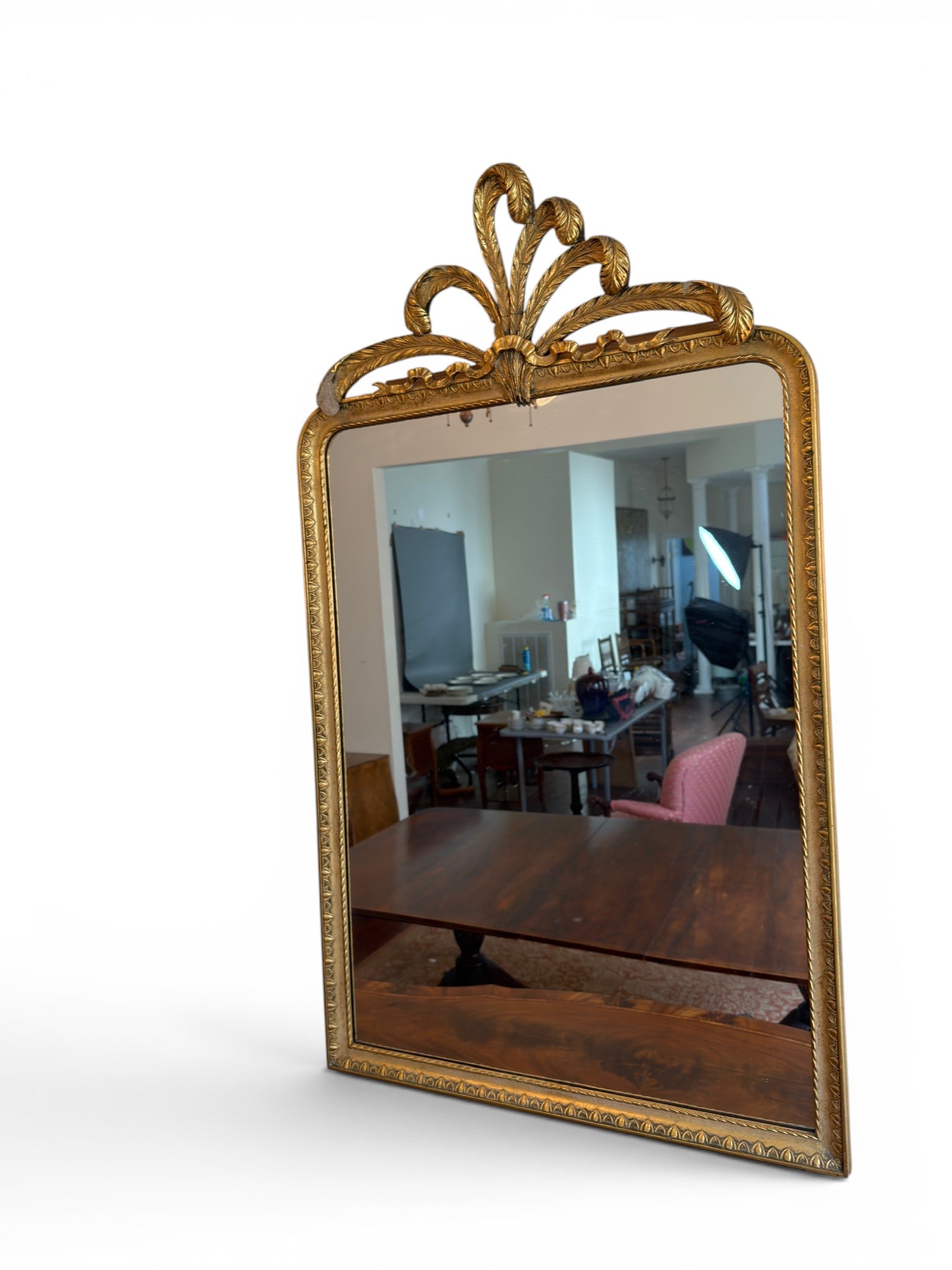 19th C. FRENCH GILT WALL MIRROR: Ornate leaf or feather design at crest.