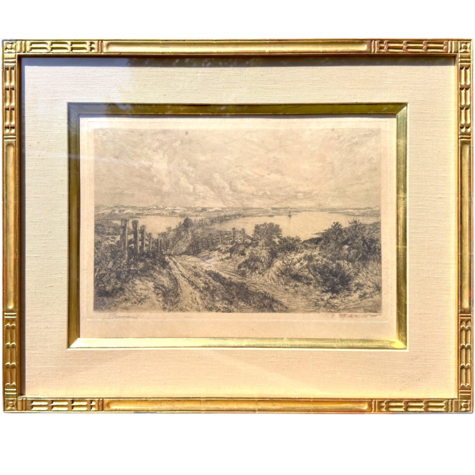 1886 EAST HAMPTON MORNING by THOMAS MORAN: 11 x 17 inches (image).signed inprint and in pencil together with a remark in contrasting ink. Presented in a custom carved and gilt frame 22 x 27.5 inches (overall)