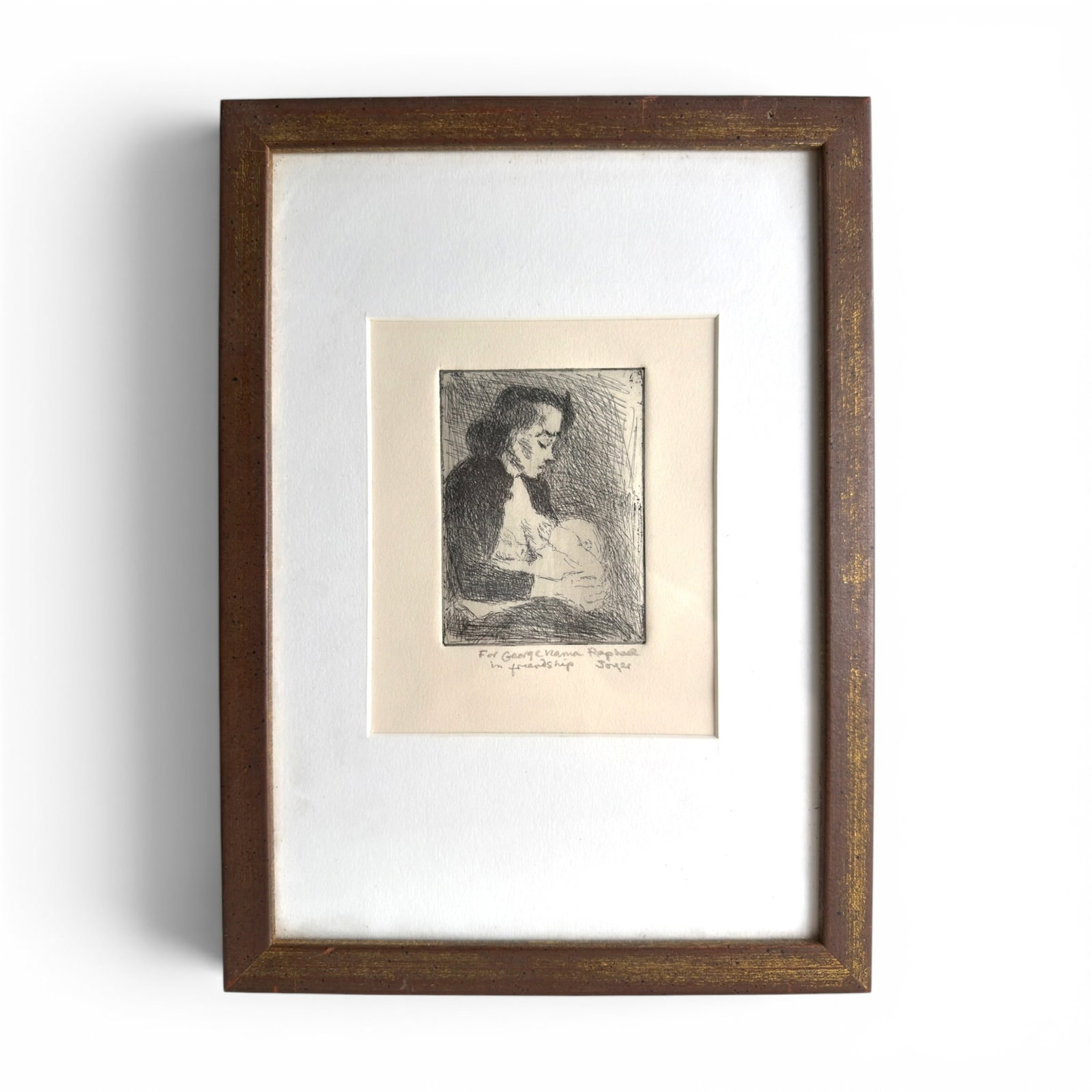 RAPHAEL SOYER (1899-1987): Mother and Child. Etching 4 x 3 inches (image) framed 12 1/2 x 9 1/4 inches (overall) N.B. Personalized to George Nama of this estate.