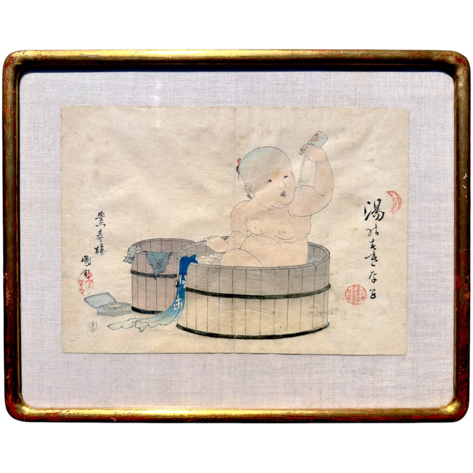 KUNICHIKA TOYOHARA (1835-1900): Baby in Bath. Woodblock print in colors 9.75 x 13.75 inches. framed 14.6 x 18.5 inches (overall)