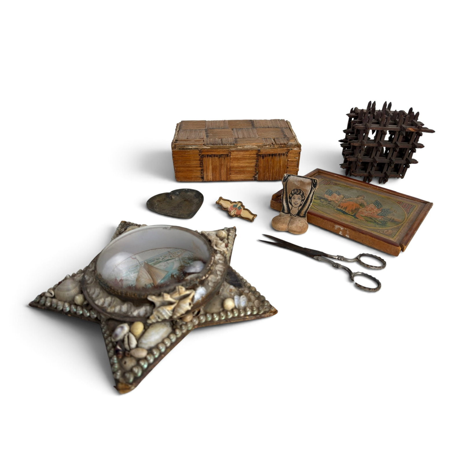 GROUP of VICTORIAN ERA CURIOSITIES: Risque paper clip, wooden tramp art puzzle, paint box with American Chromolithograph cover, heart, pin, matchstick box and German scissors by Graef & Schmidt scissors. Matchstick box is 2.25 x 7.75 x 