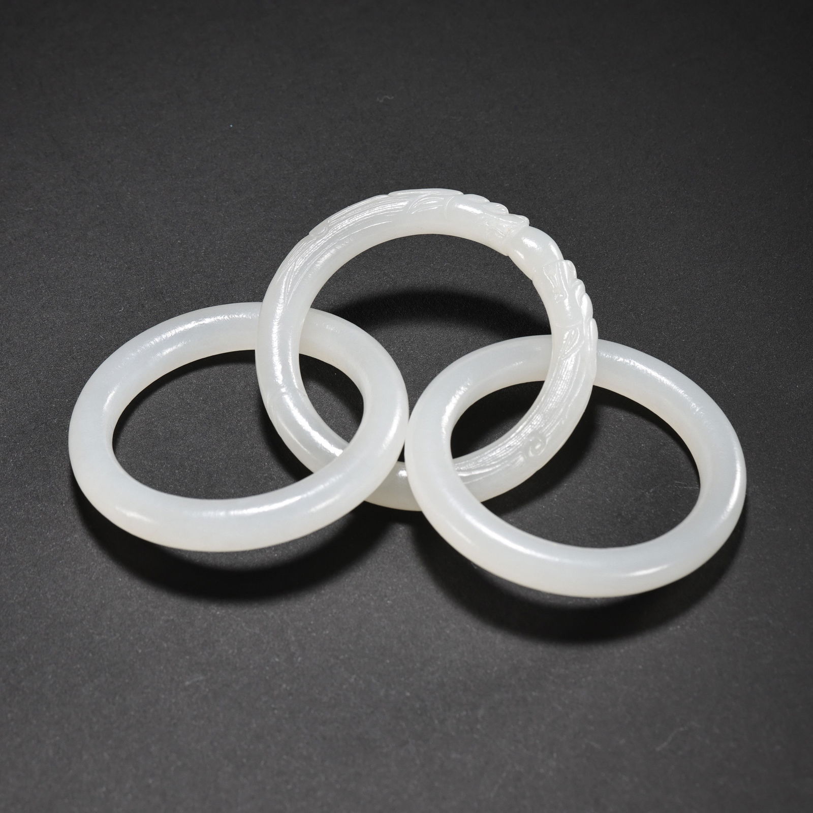 THREE HETIAN JADE RINGS, QING DYNASTY (1 of 9)