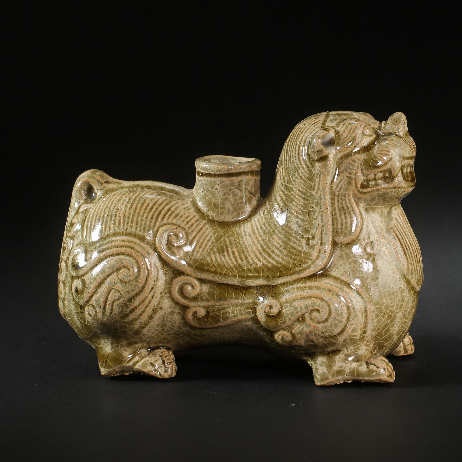 CELADON STATUES OF LIONS, SOUTHERN AND NORTHERN: H. 10.5 cm. W. 15 cm.