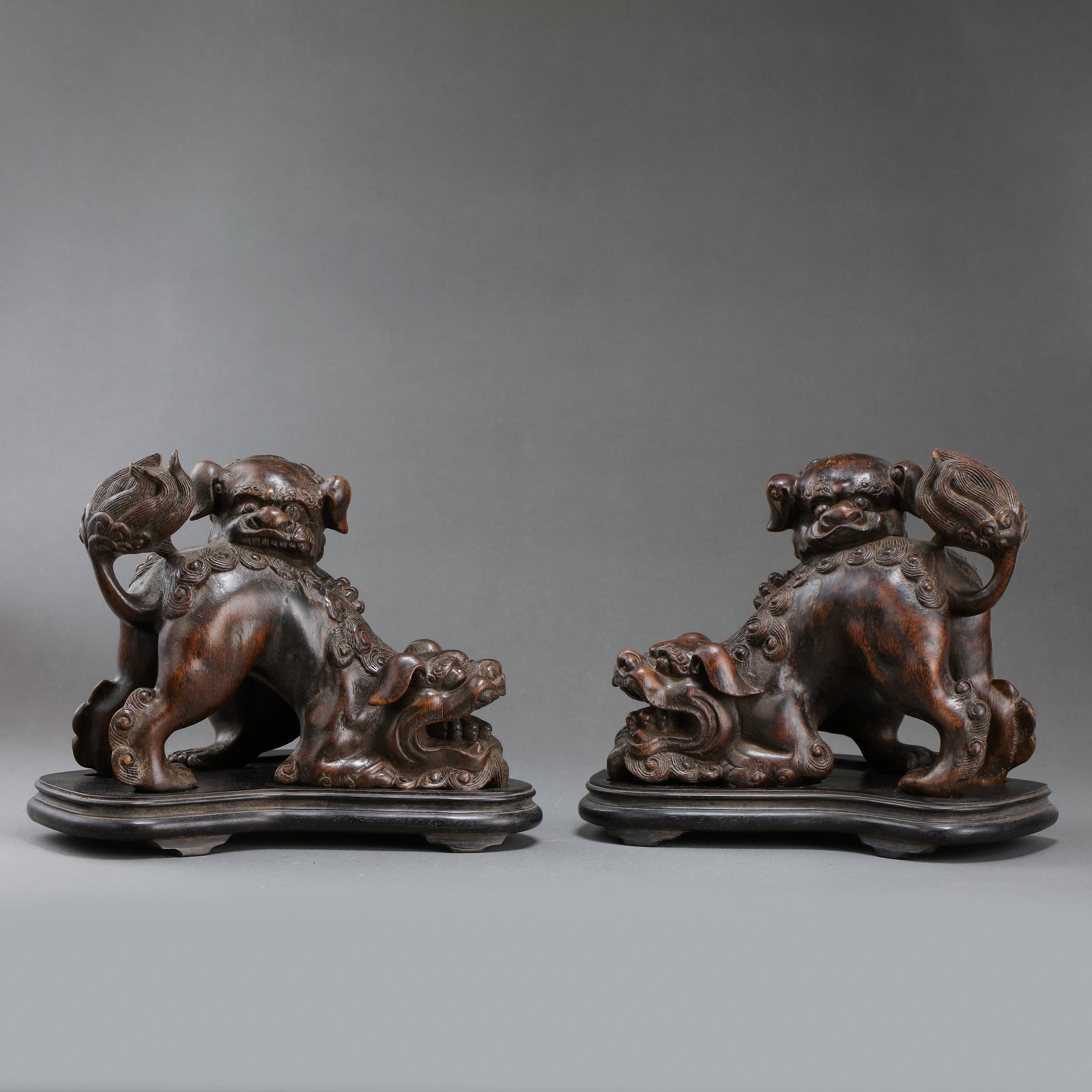 A PAIR OF SANDALWOOD LION STATUES FROM QING DYNASTY (1 of 18)