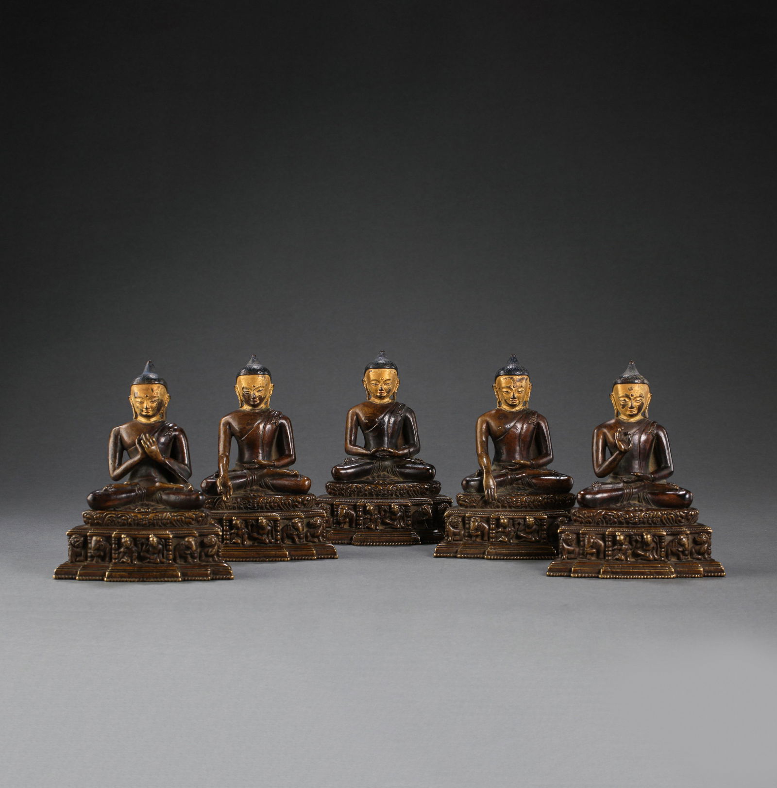 A GROUP OF SEATED ALLOY BRONZE BUDDHA STATUES, MING DYNASTY, CHINA (1 of 15)