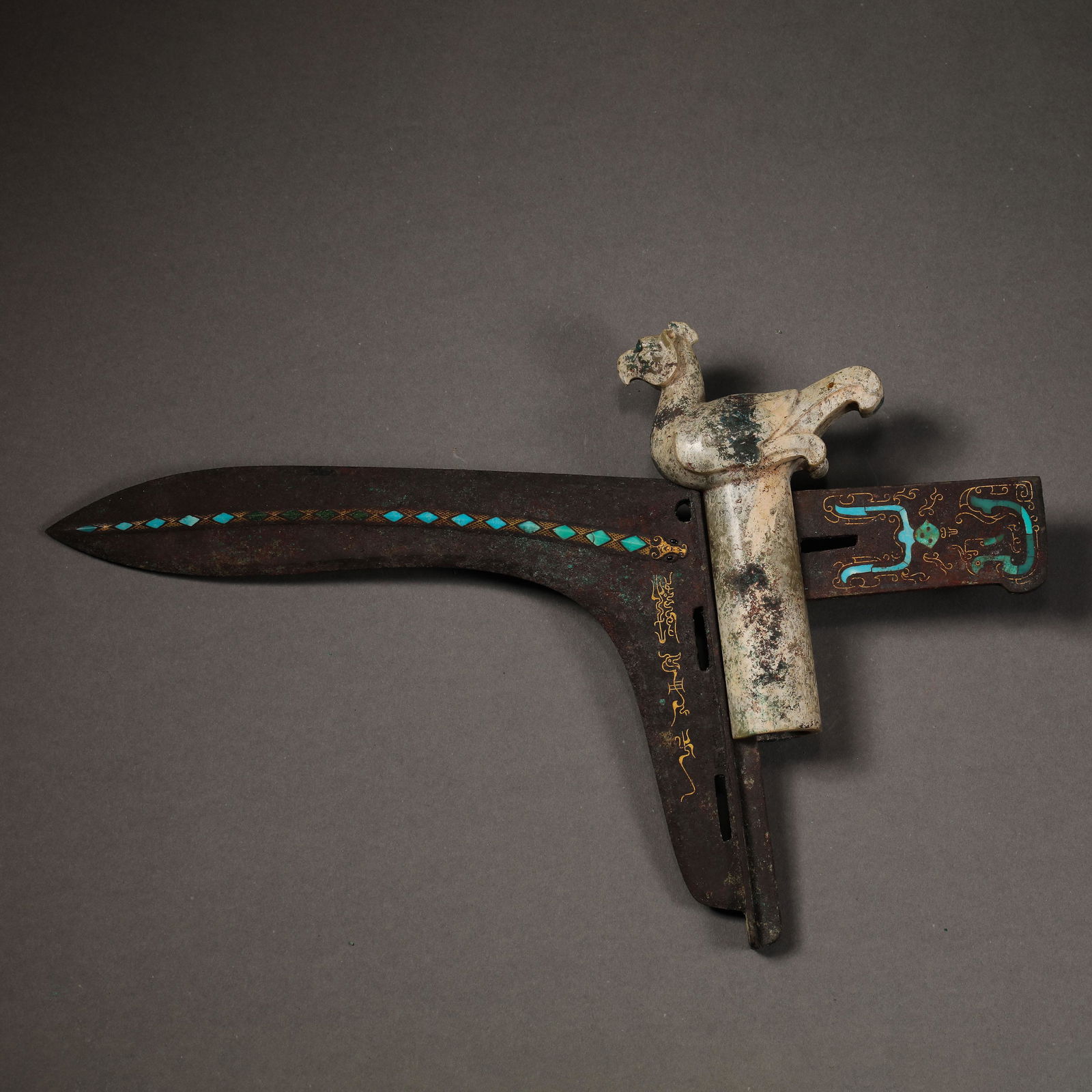 CHINESE WARRING STATES PERIOD BRONZE INLAID TURQUOISE JADE BIRD GE: CHINESE WARRING STATES PERIOD BRONZE INLAID TURQUOISE JADE BIRD GE W. 18.5 cm. L. 29.3 cm. Weight 562 gram.