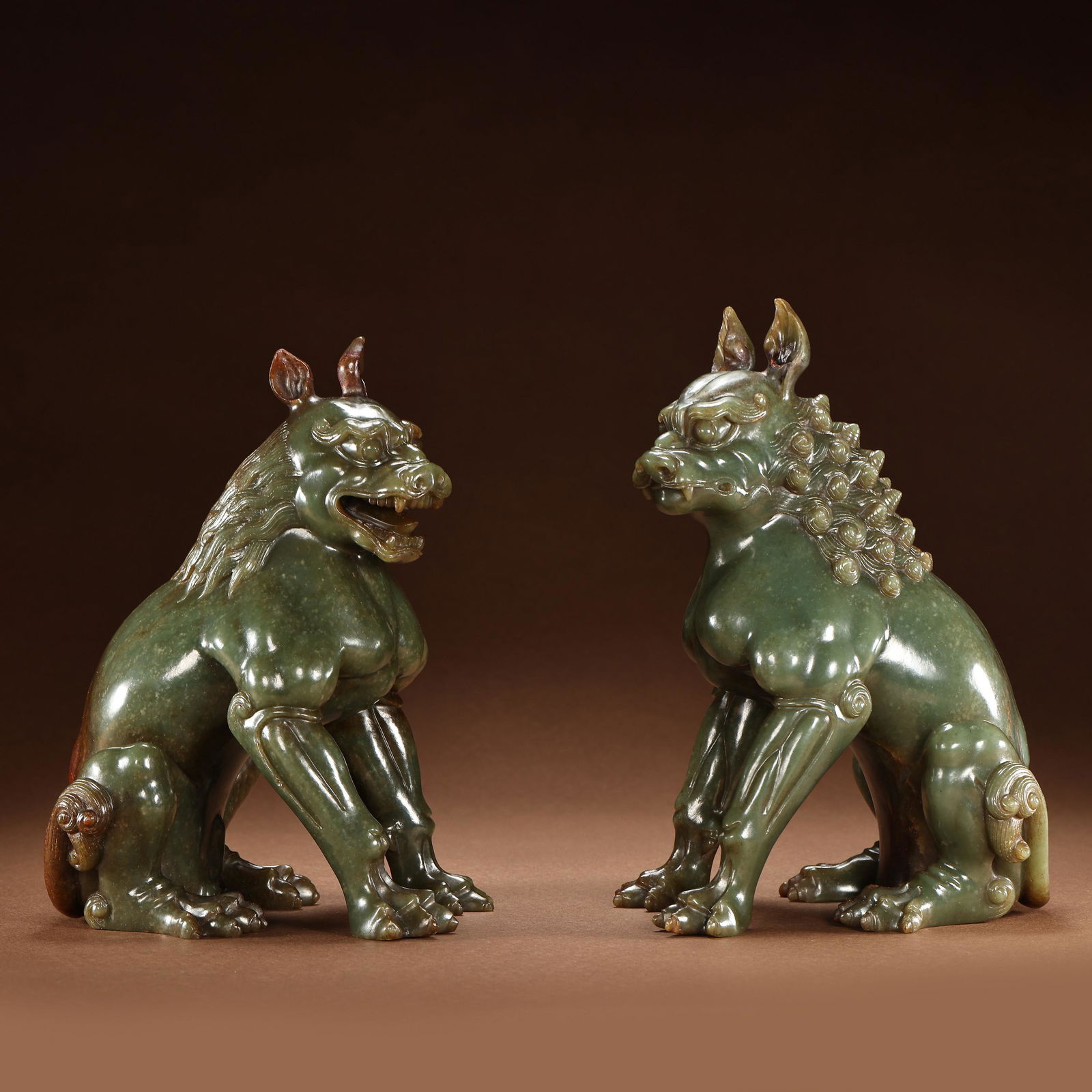 A PAIR OF CHINESE QING DYNASTY HETIAN JASPER BEASTS (1 of 19)