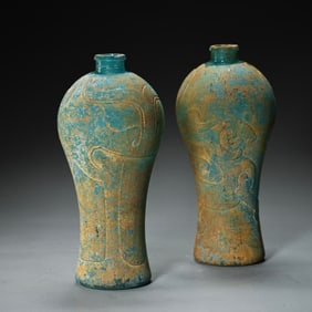 A PAIR OF CHINESE TANG DYNASTY GLASS BOTTLES